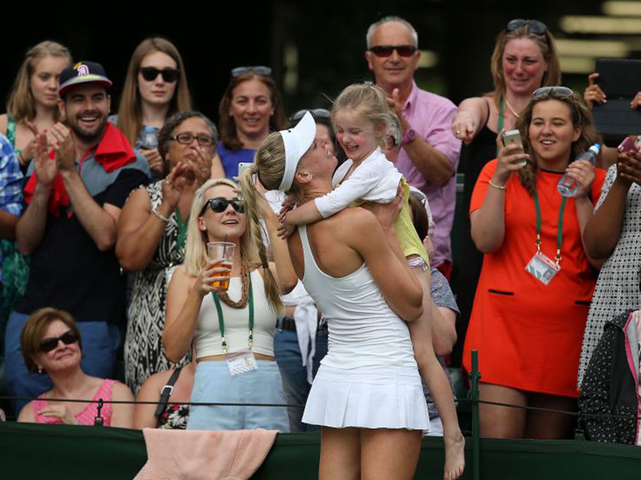 Naomi Broady celebrates her victory with her four-year-old niece Lola