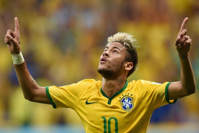 Brazil's forward Neymar celebrates after scoring a second goal