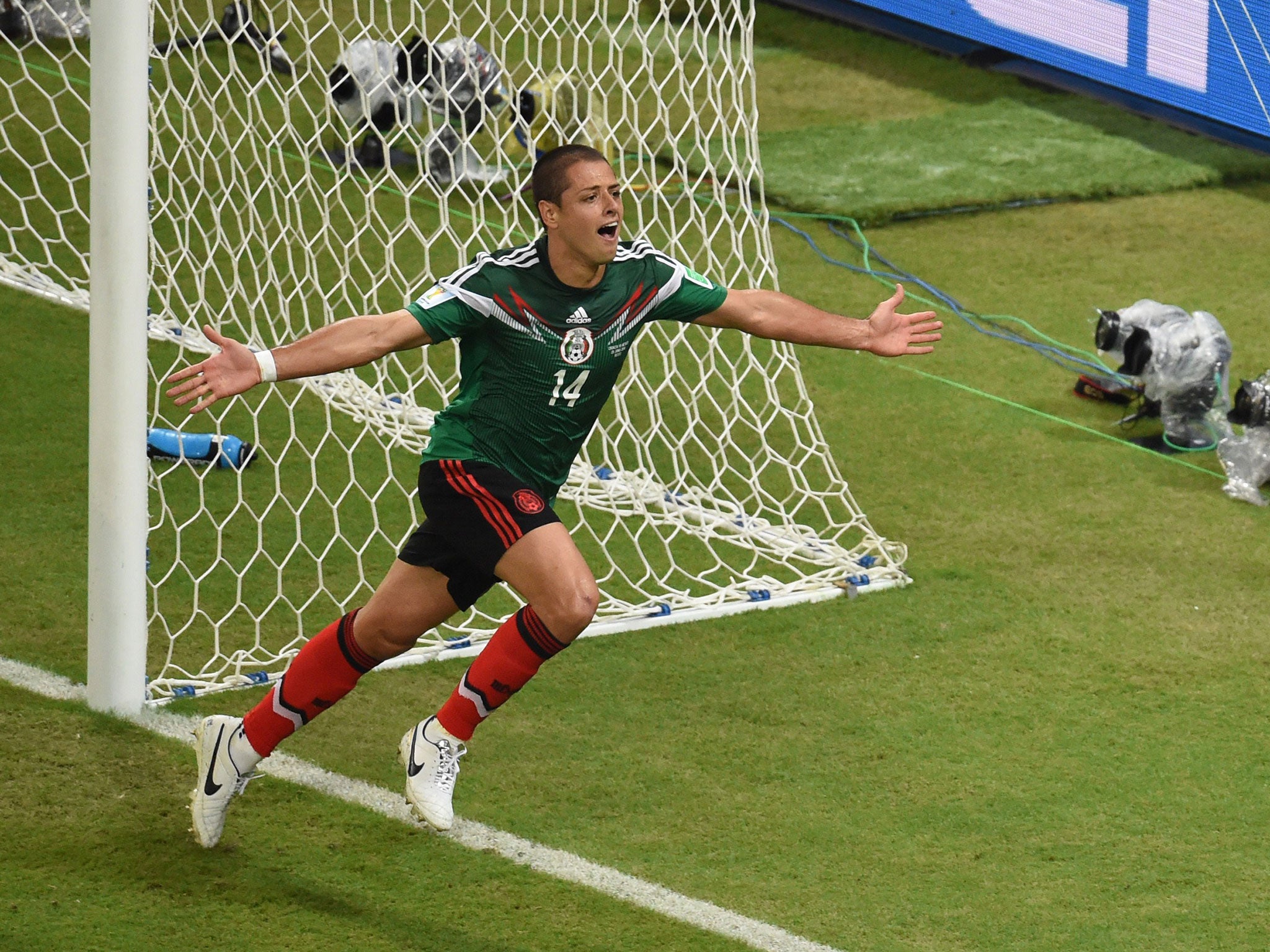Mexico striker Javier Hernandez celebrates scoring against Croatia