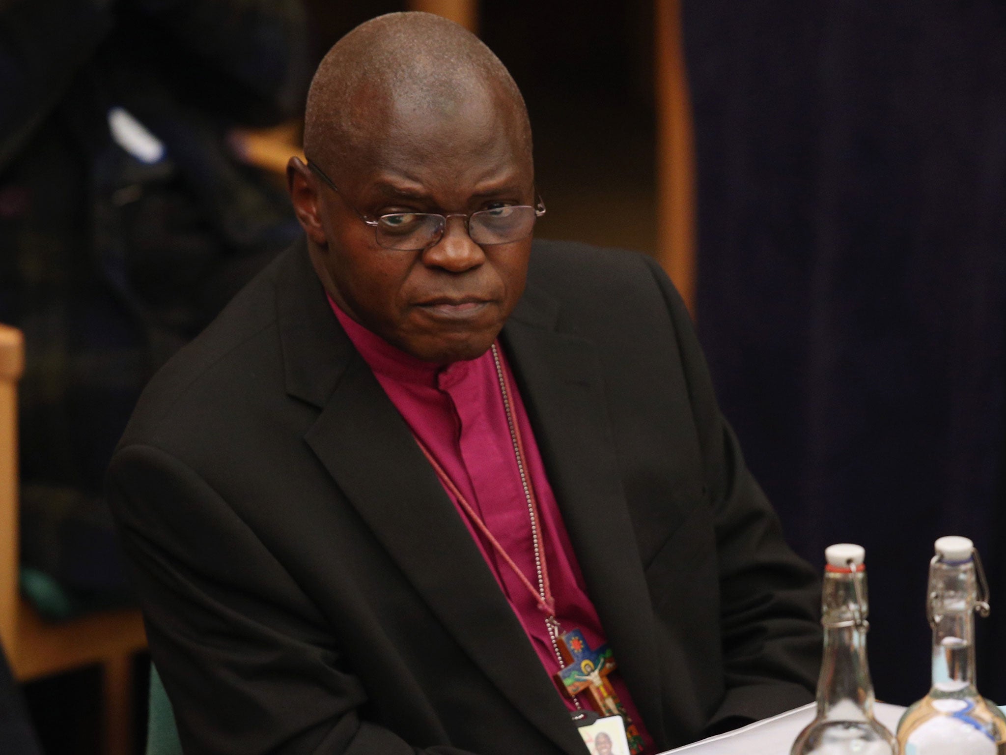 Dr John Sentamu, the Archbishop of York, sits after addressing the General Synod on November 19, 2013 in London, England.
