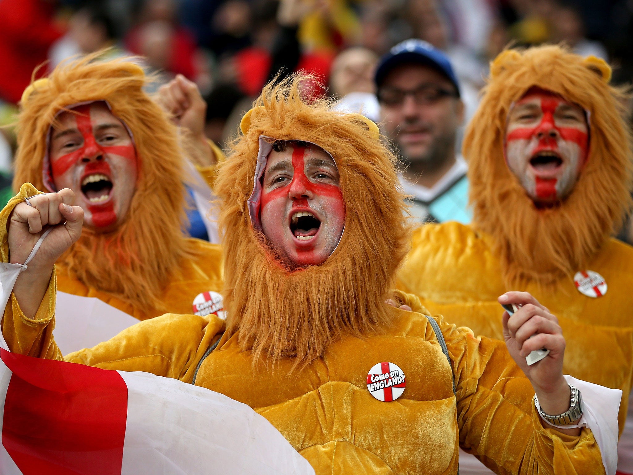 England fans cheer on the side during the 2-1 defeat to Uruguay