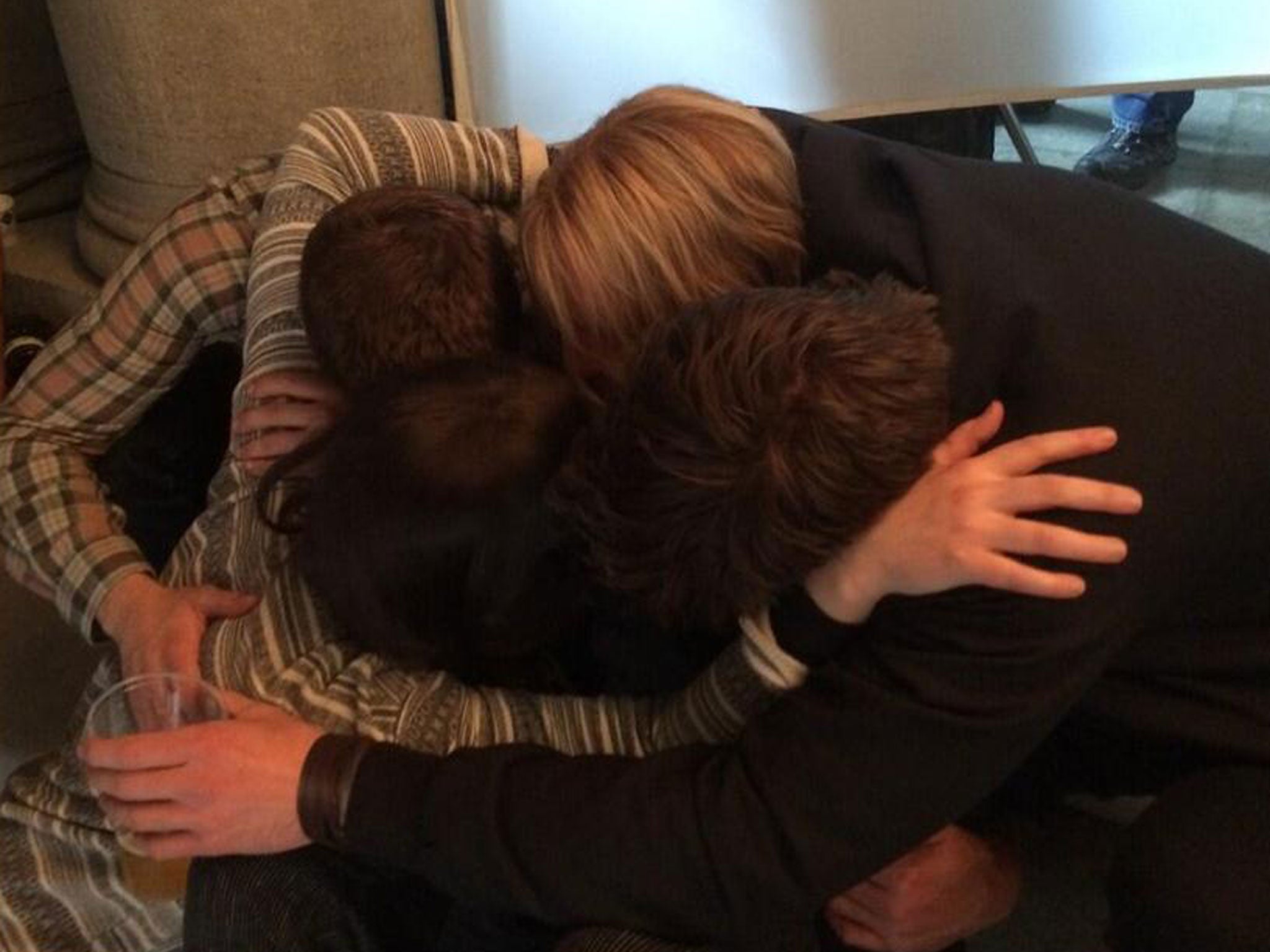 Jennifer Lawrence, Liam Hemsworth, Josh Hutcherson and Woody Harrelson hugging