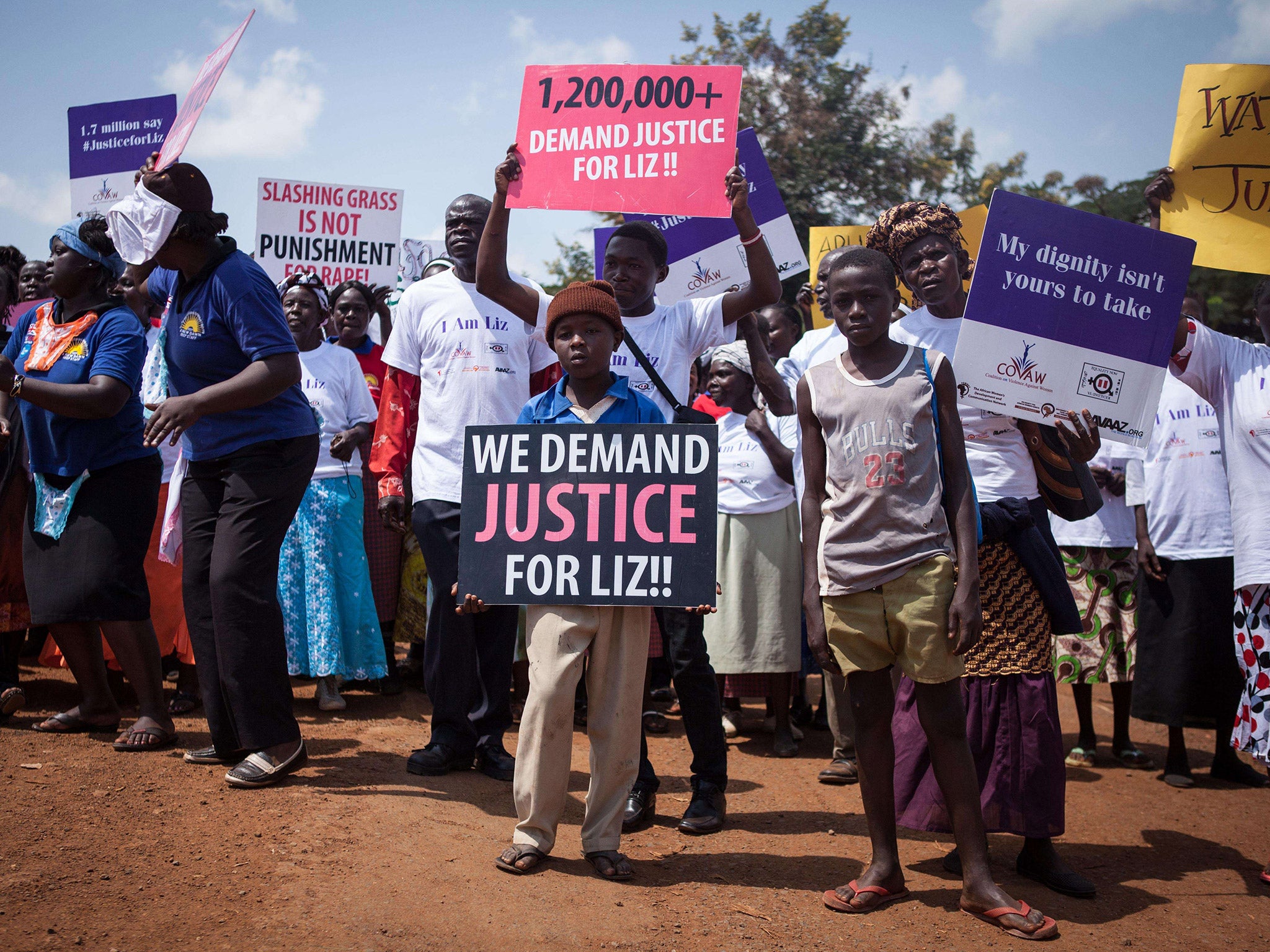 Protesters march through the Kenyan border town of Busia