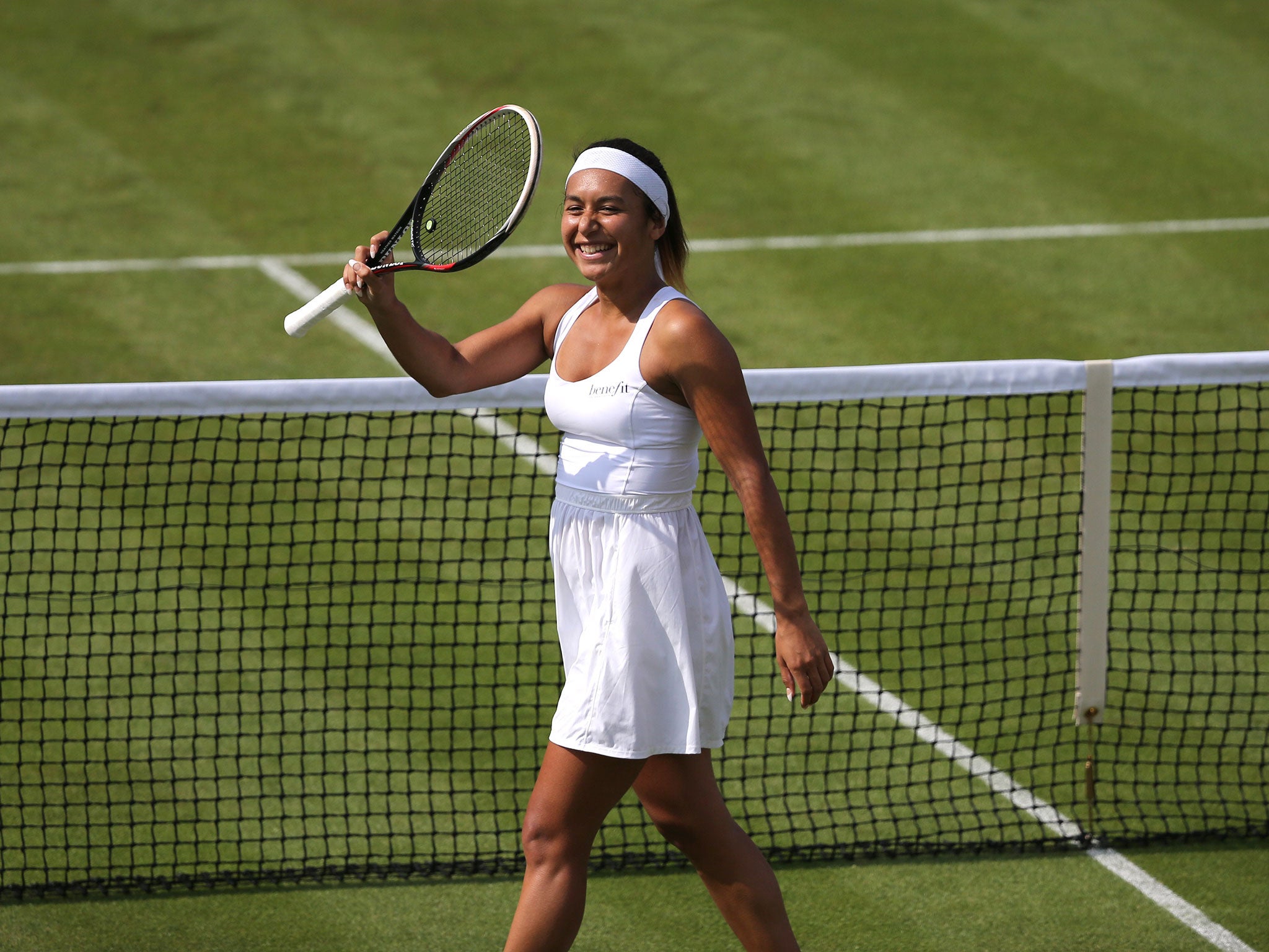 Britain's Heather Watson celebrates after winning her women's singles first round match against Croatia's Ajla Tomljanovic on day two of the 2014 Wimbledon Championships
