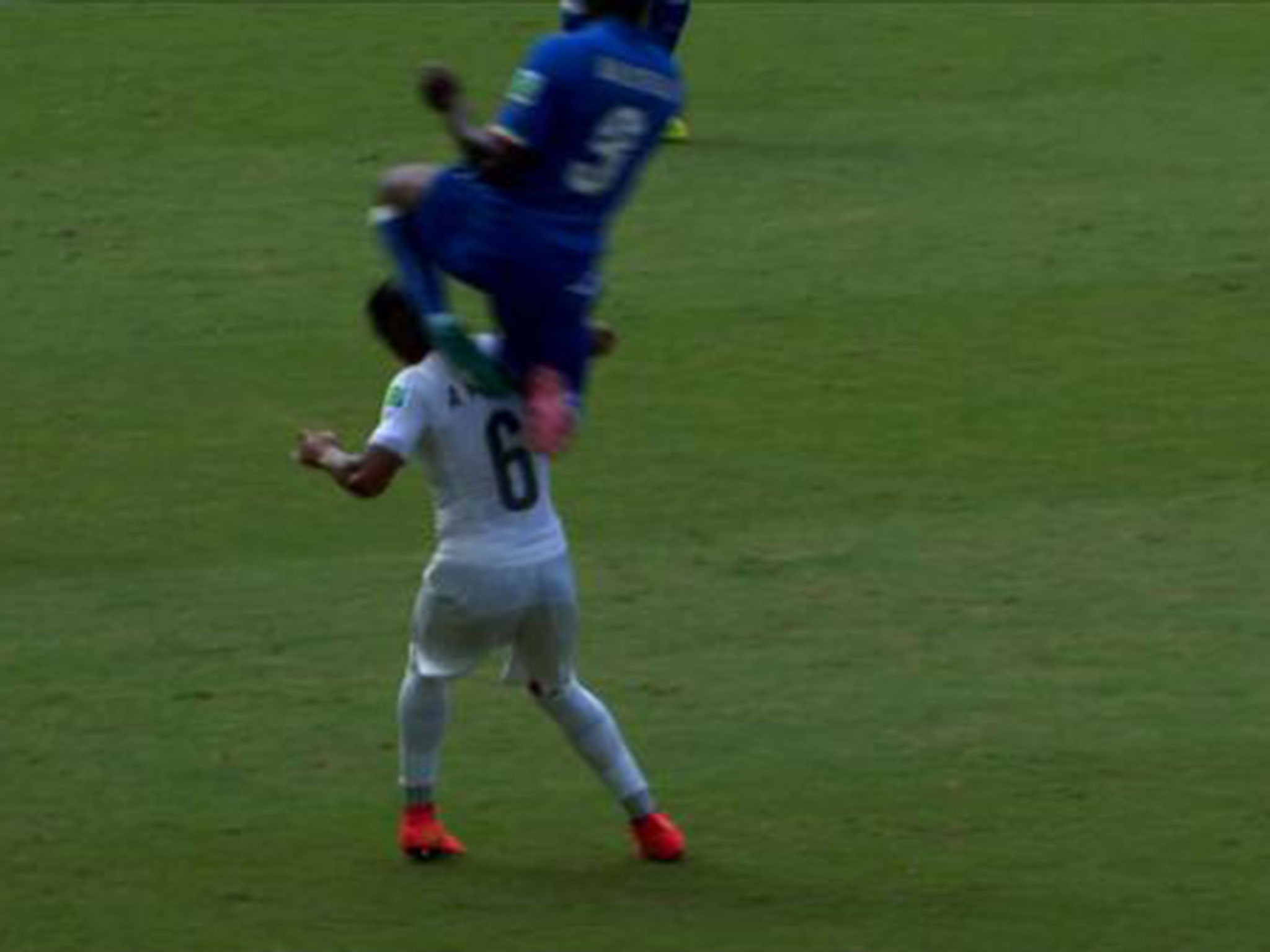 Balotelli was booked for this challenge on Alvaro Pereira during Italy's World Cup clash with Uruguay