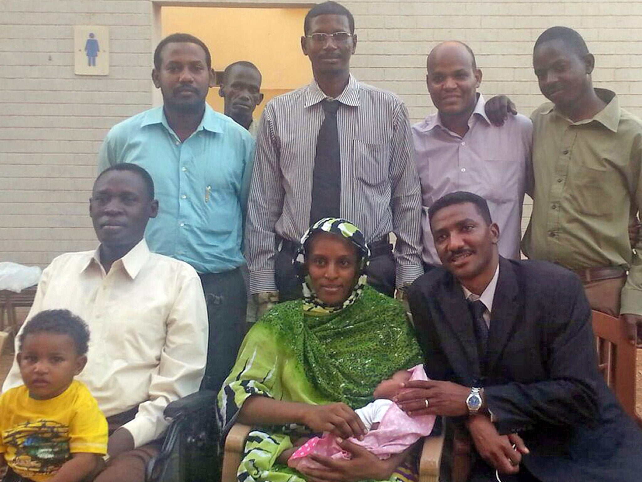 Meriam Ibrahim with her husband Daniel Wani (left), and two sons, after her release