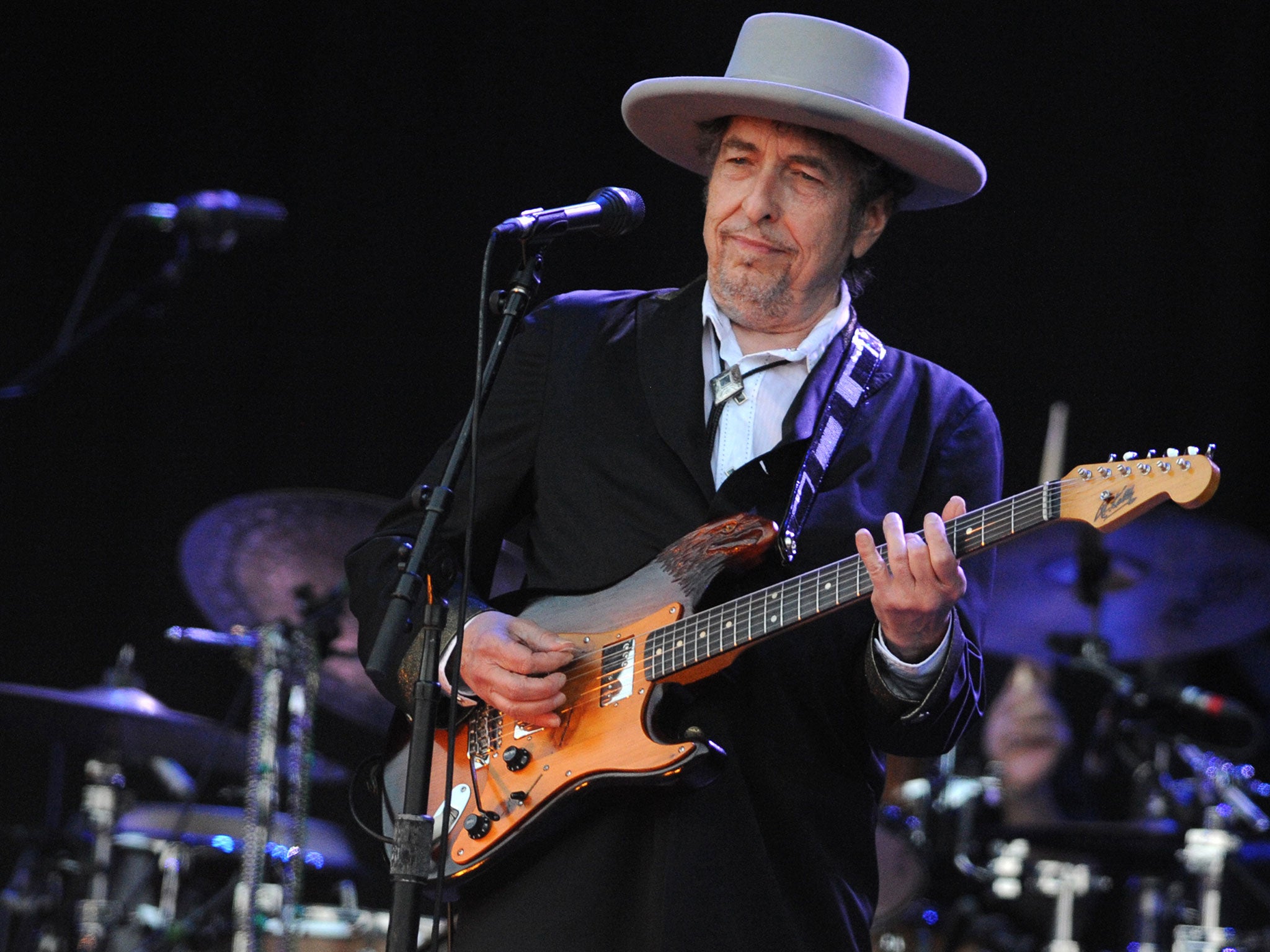 Singer songwriter Bob Dylan performs on stage