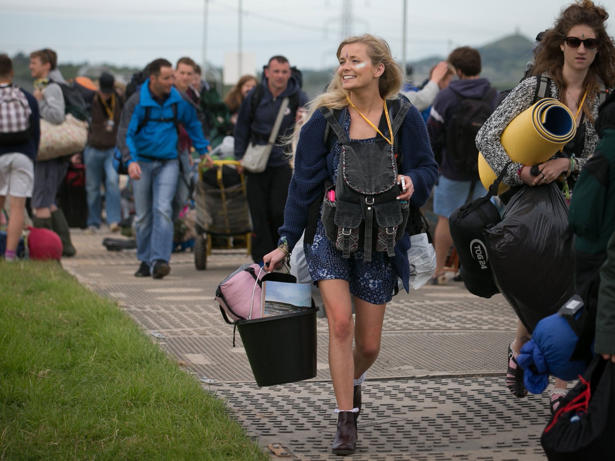 Festival goers arrive at Worthy Farm in Pilton for the first day of the 2014 Glastonbury Festival