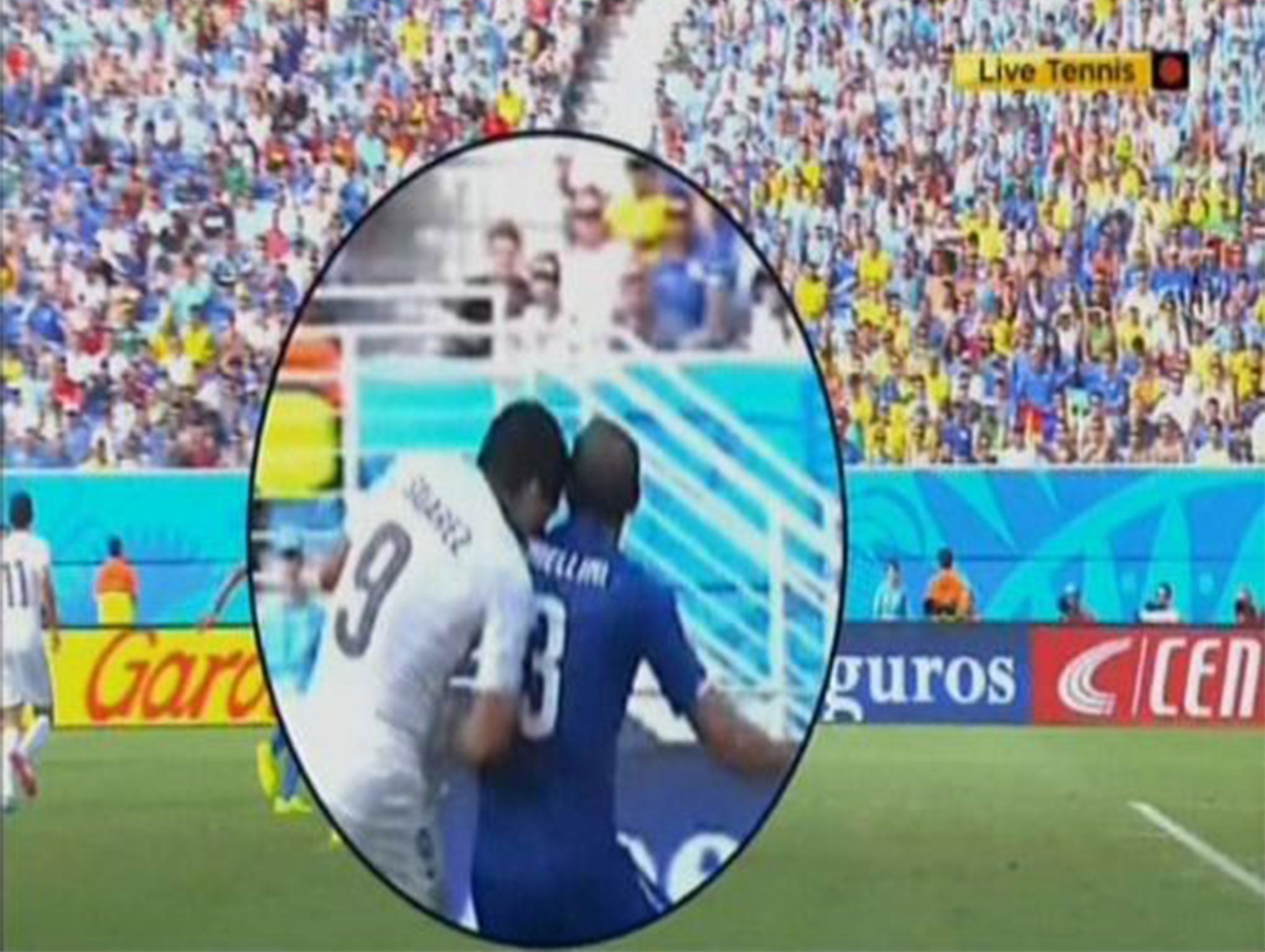 Suarez bites Giorgio Chiellini during the World Cup