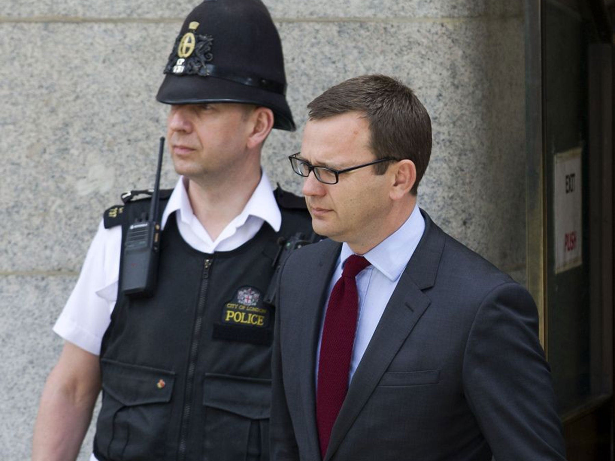Former News of the World editor Andy Coulson leaves the Old Bailey in central London, on June 25, 2014.