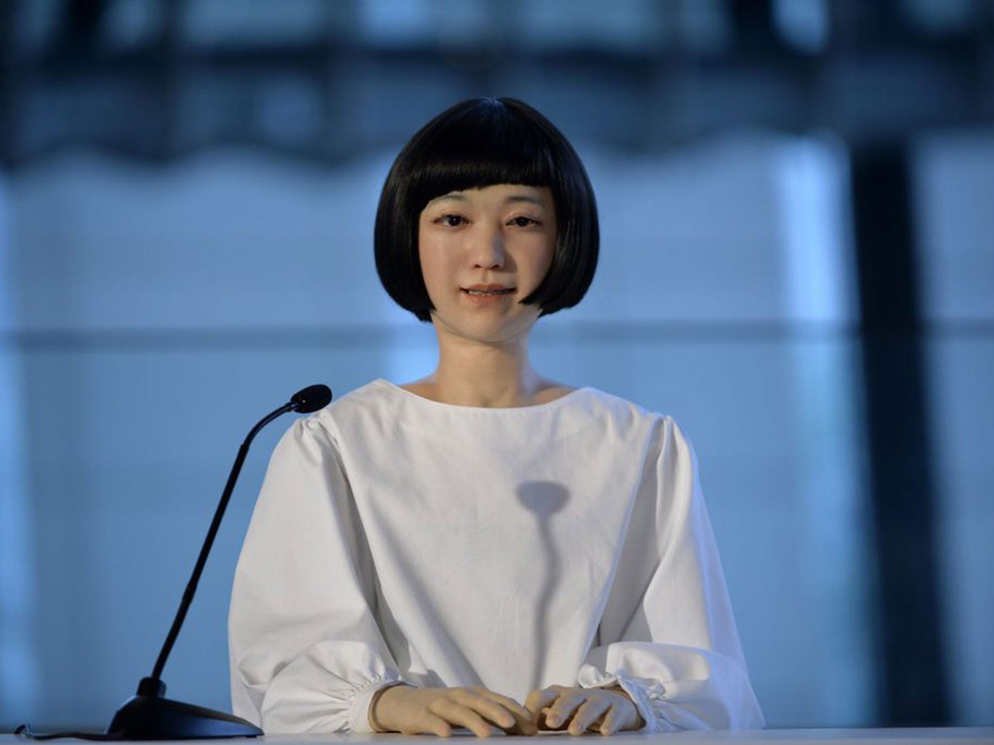 scientists create creepy robot newsreader with human face | The Independent | The Independent
