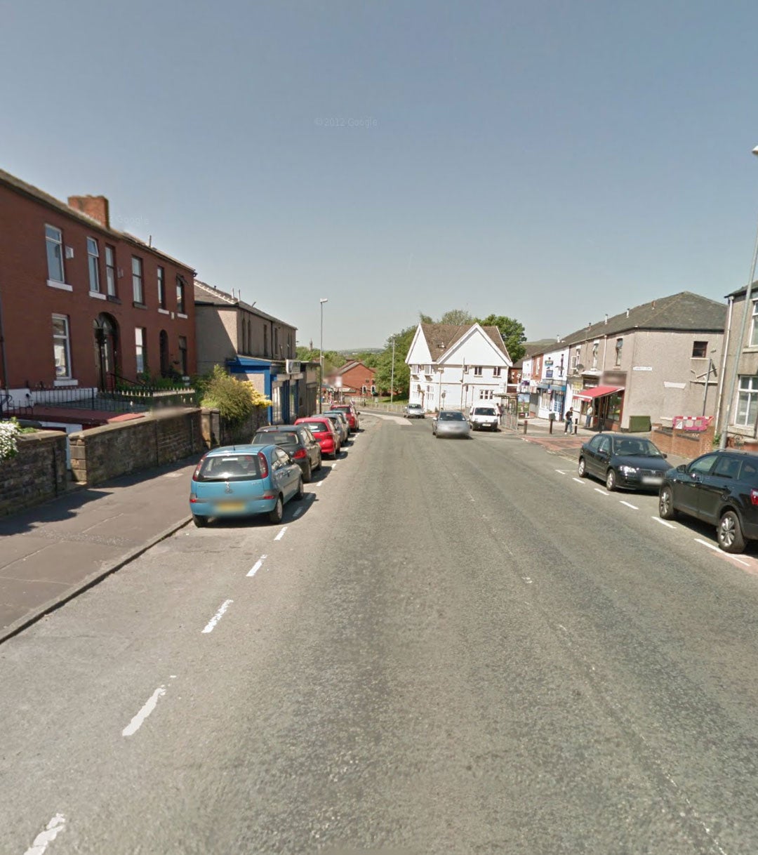 Greater Manchester police have appealed for information after a 90-year-old woman was dragged off the street on Spotland Road (pictured) as she walked to her local shop in Rochdale and raped.
