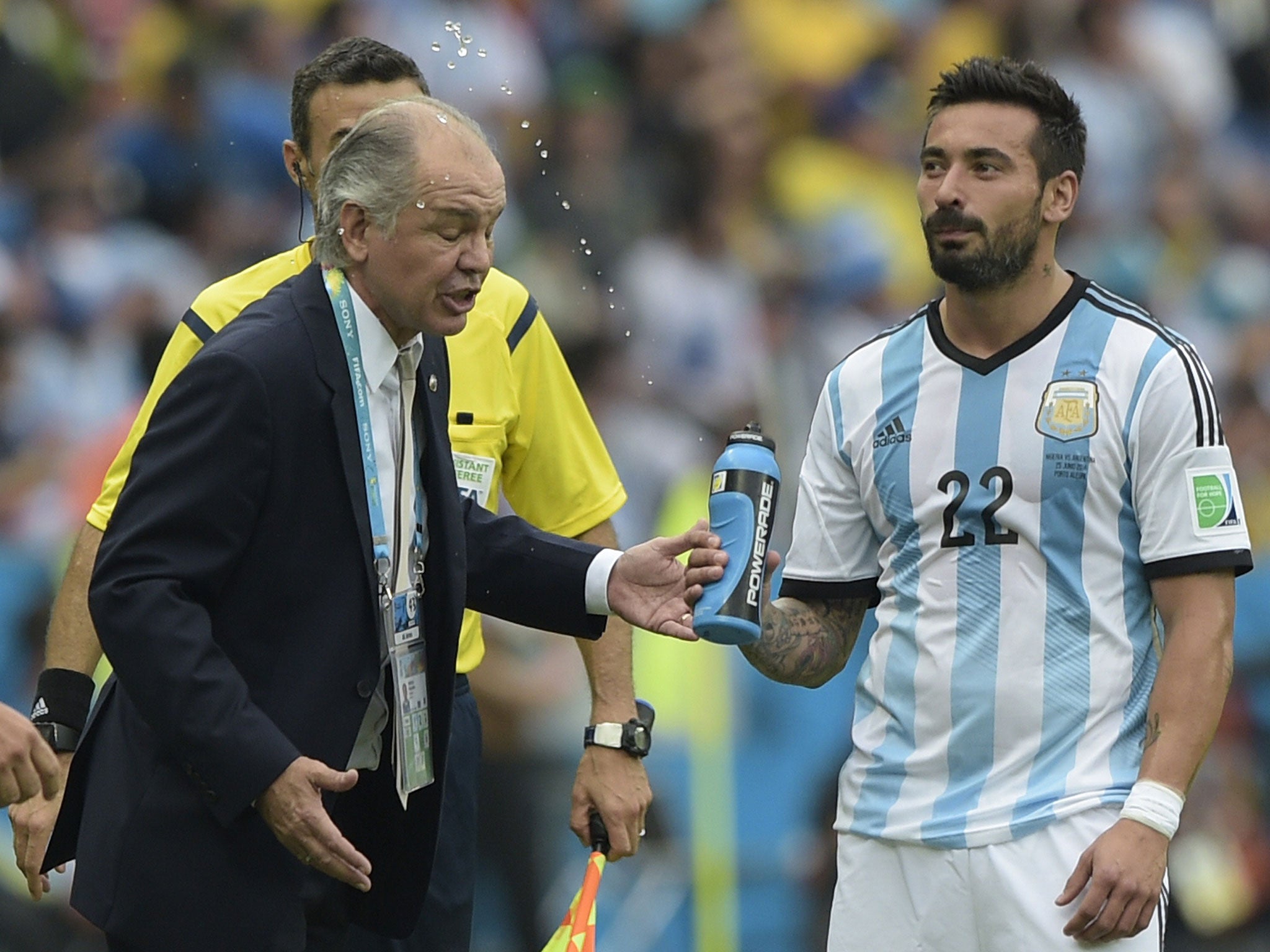 Argentina striker Ezequiel Lavezzi SQUIRTED his manager Alejandro Sabella with water