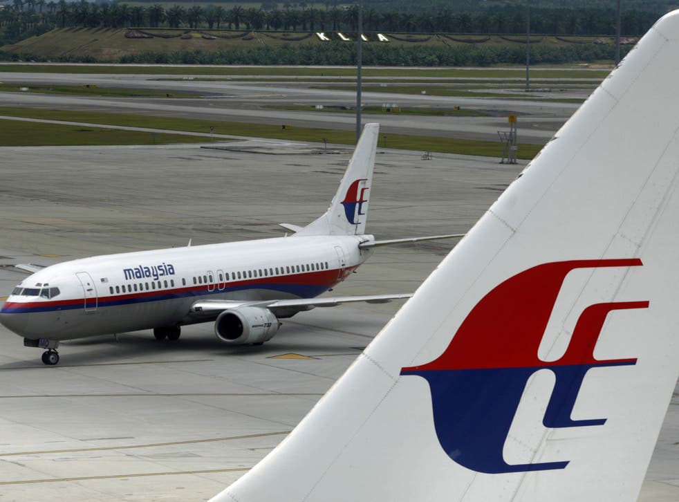 File: A Malaysia Airlines aircraft taxis on the tarmac at Kuala Lumpur International Airport