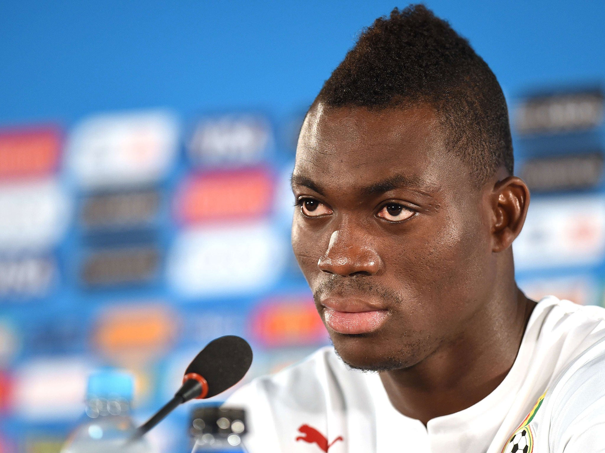 Ghana's midfielder Christian Atsu Twasam looks on during a press conference at the Mane Garrincha National Stadium in Brasilia