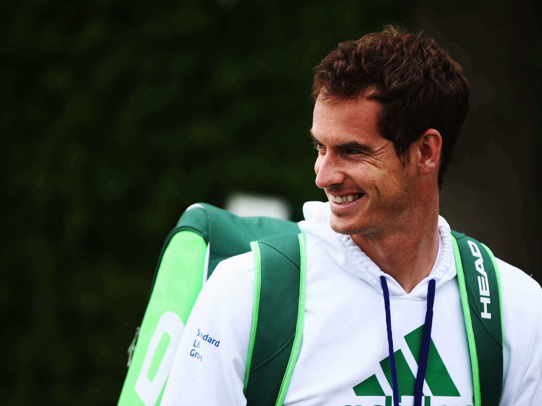 Andy Murray walks out to start a practice session on day four of the Wimbledon Lawn Tennis Championships