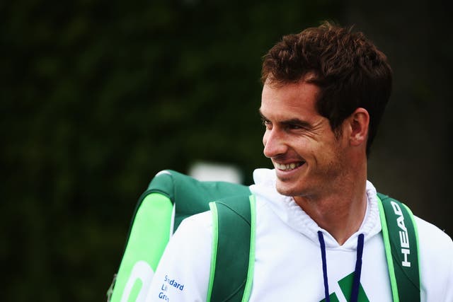 Andy Murray walks out to start a practice session on day four of the Wimbledon Lawn Tennis Championships