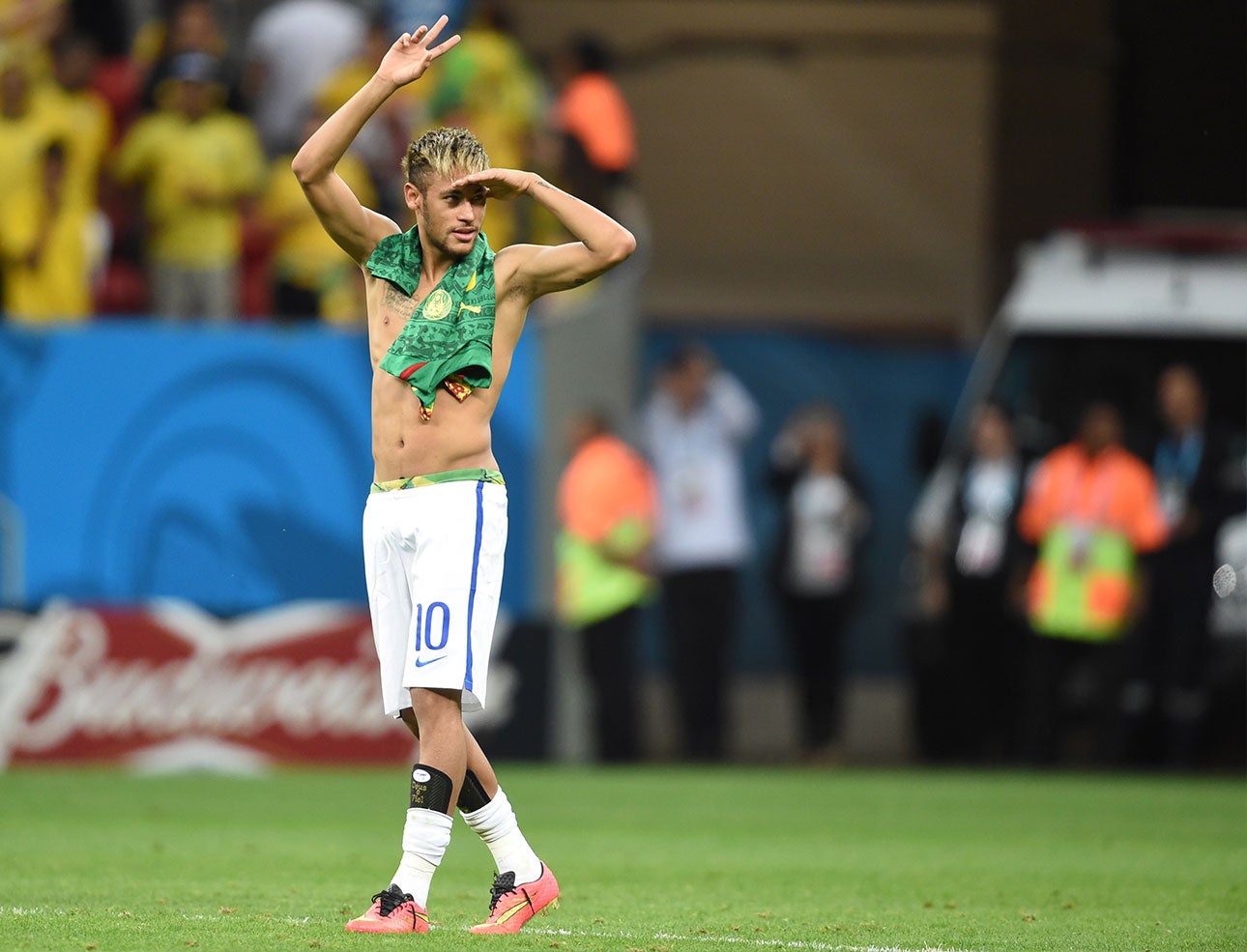 Brazil's forward Neymar leaves the pitch after a Group A football match between Cameroon and Brazil at the Mane Garrincha National Stadium in Brasilia during the 2014 FIFA World Cup on June 23, 2014.