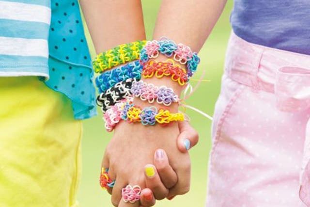 The Rainbow Loom weaves elastics into bracelets