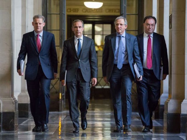 Senior policymakers at the Bank of England (from left)  Spencer Dale, Mark Carney, Jon Cunliffe and Andrew Bailey prepare to deliver their report 