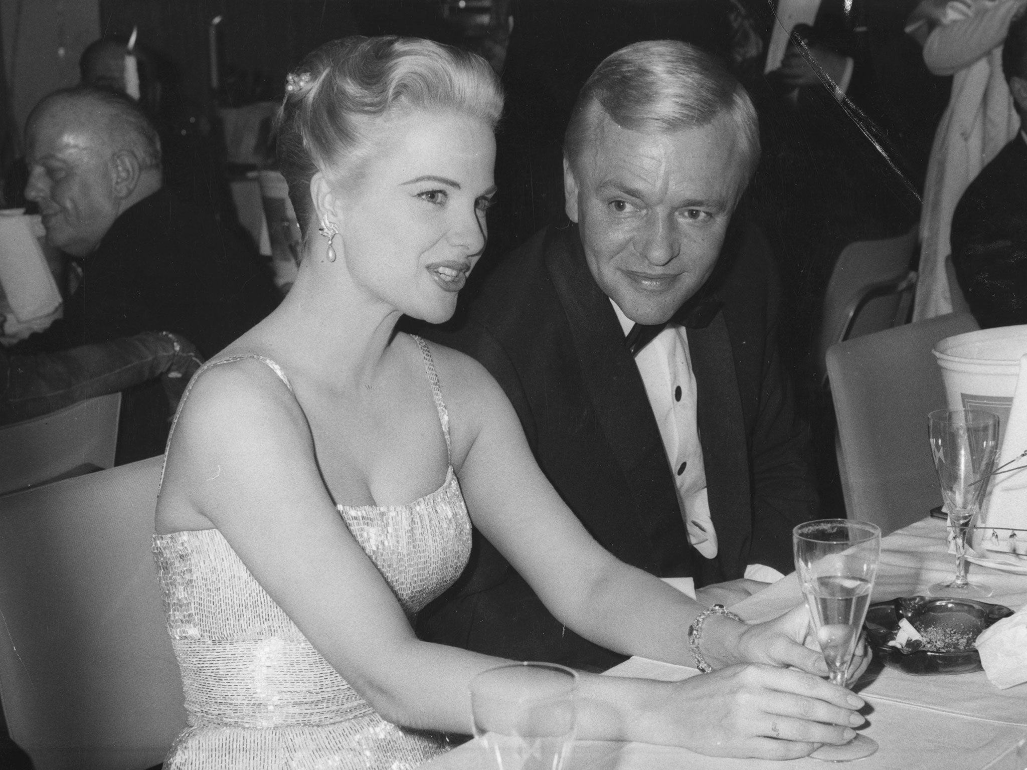 American actress Martha Hyer and Peter van Eyck at the 1960 Film Ball at the Hilton Hotel in Berlin
