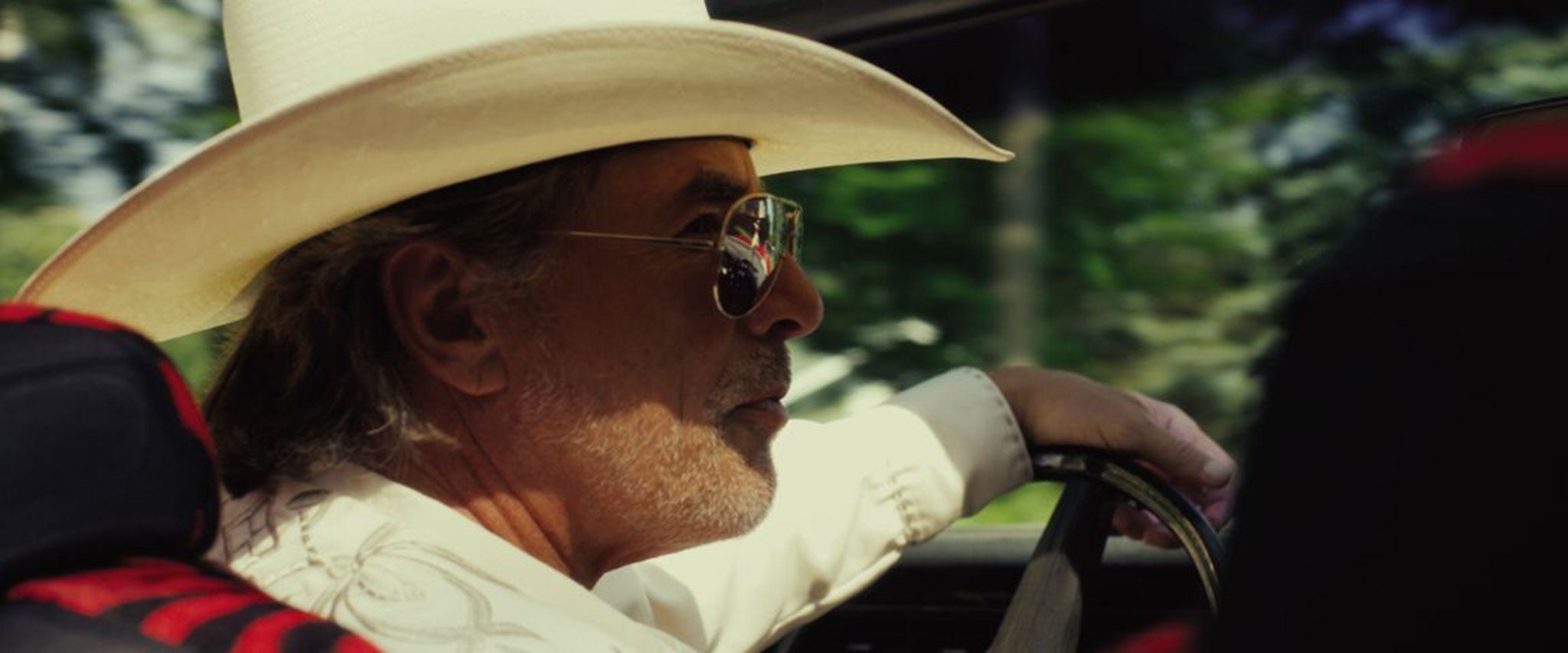 Incongruously flashy: Don Johnson's arrival changes the mood of the film