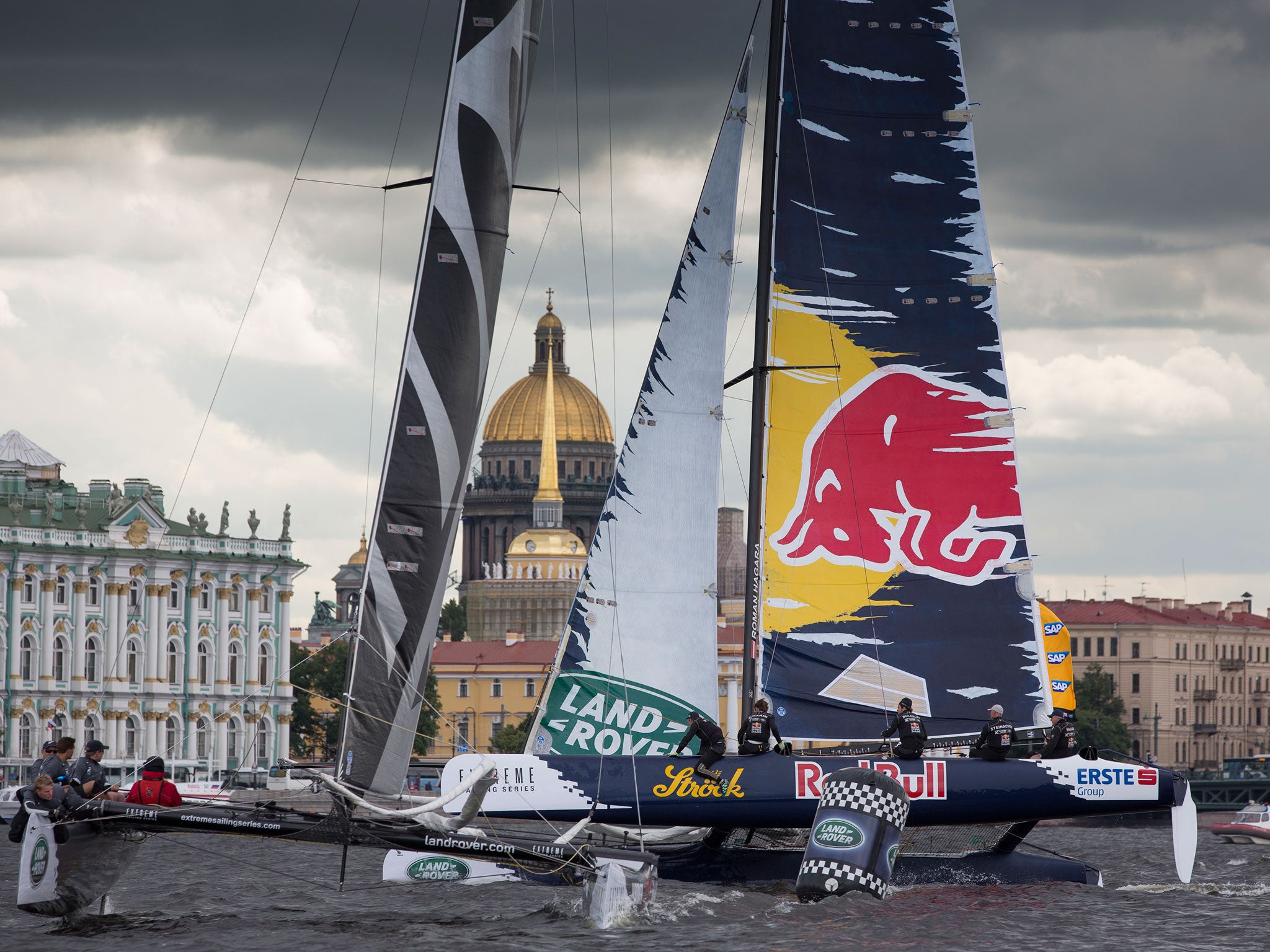Flat conditions did not prevent spikey action between Team New Zealand and Red Bull on St. Petersburg’s Neva River on the opening day of the Extreme Sailing Series. The cathedral of St. Isaac stands quietly in the background.