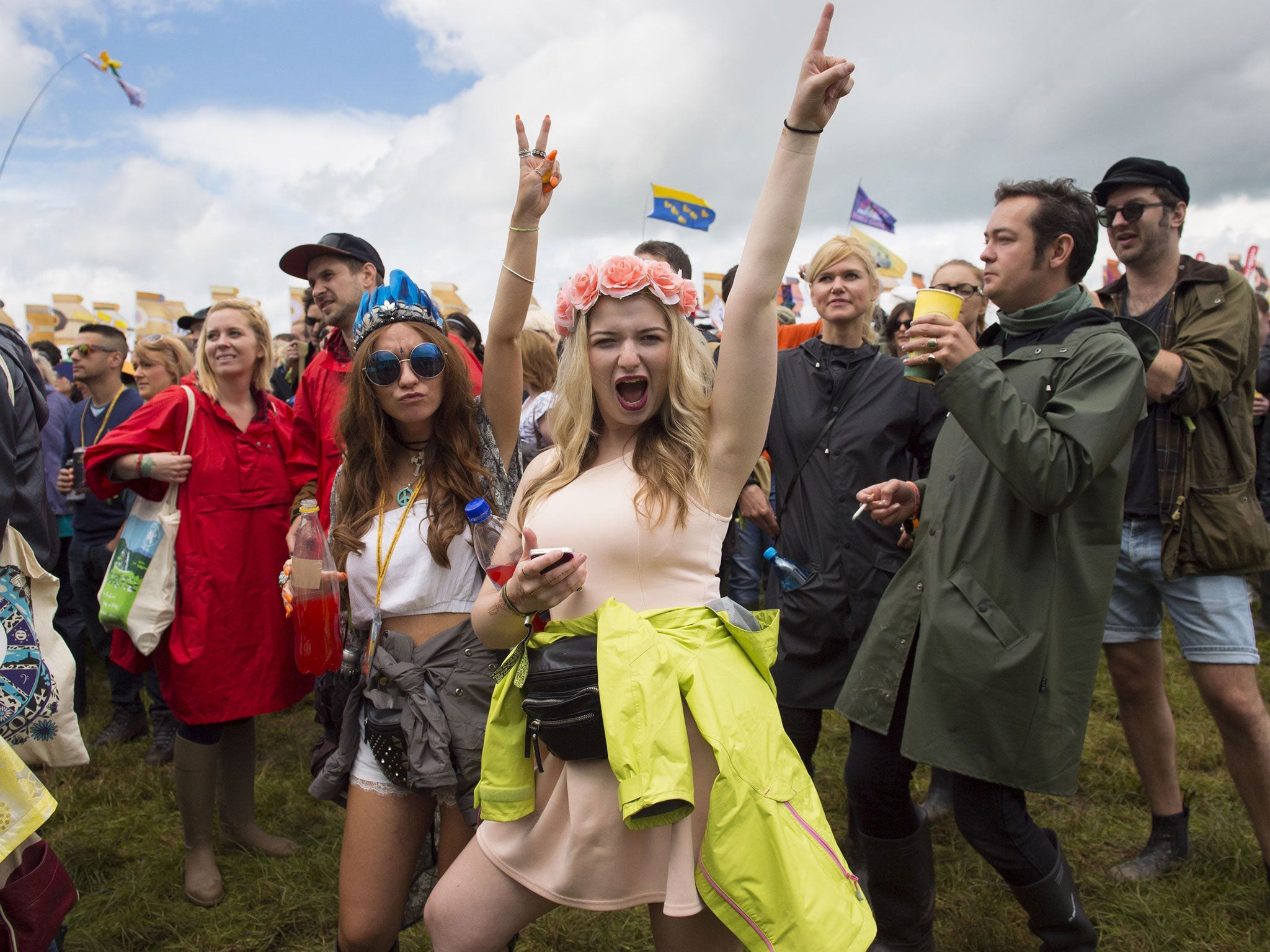 Festival goers at the Glastonbury Festival at Worthy Farm in Somerset