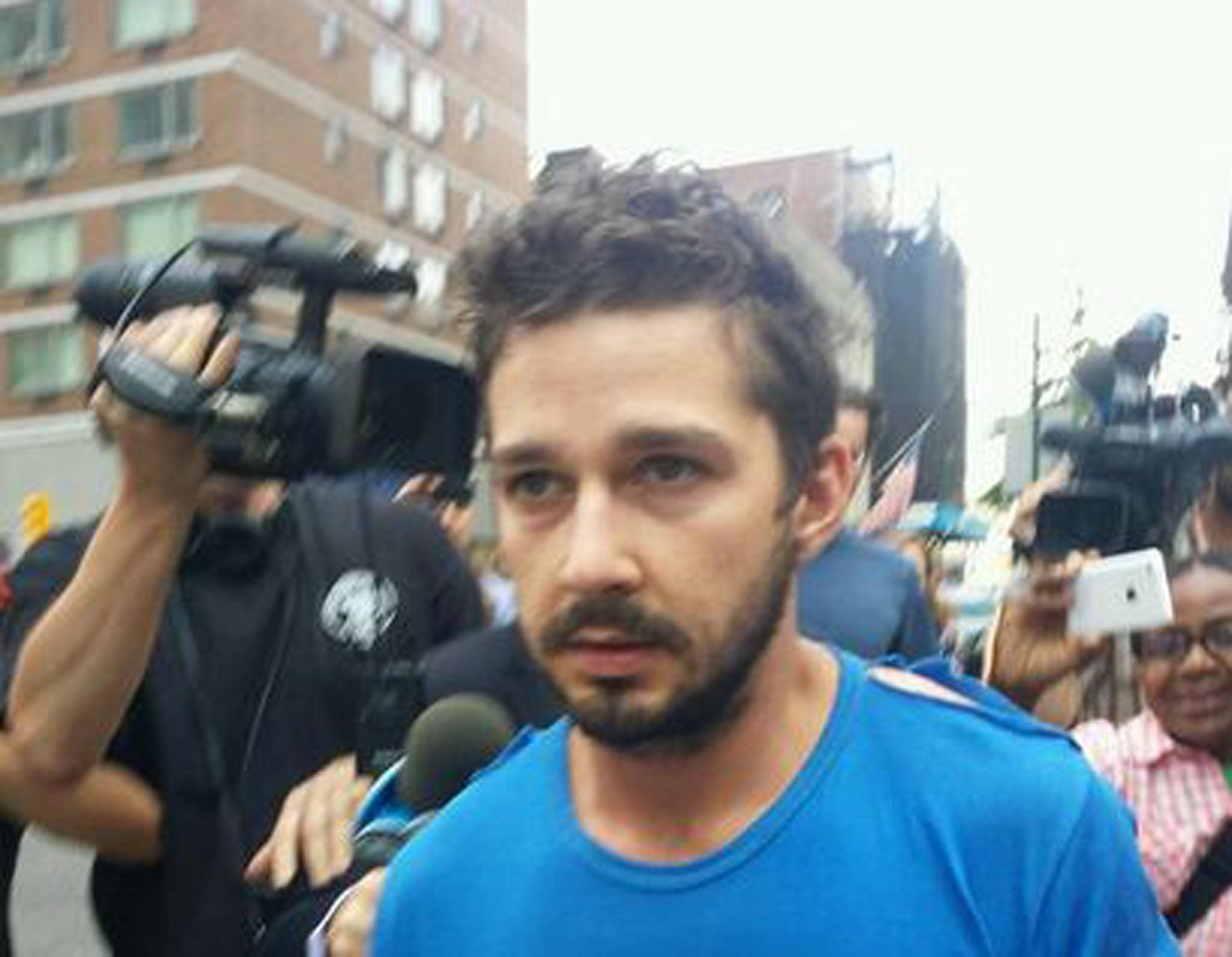 LaBeouf was surrounded by the press as he left a New York police station on Friday