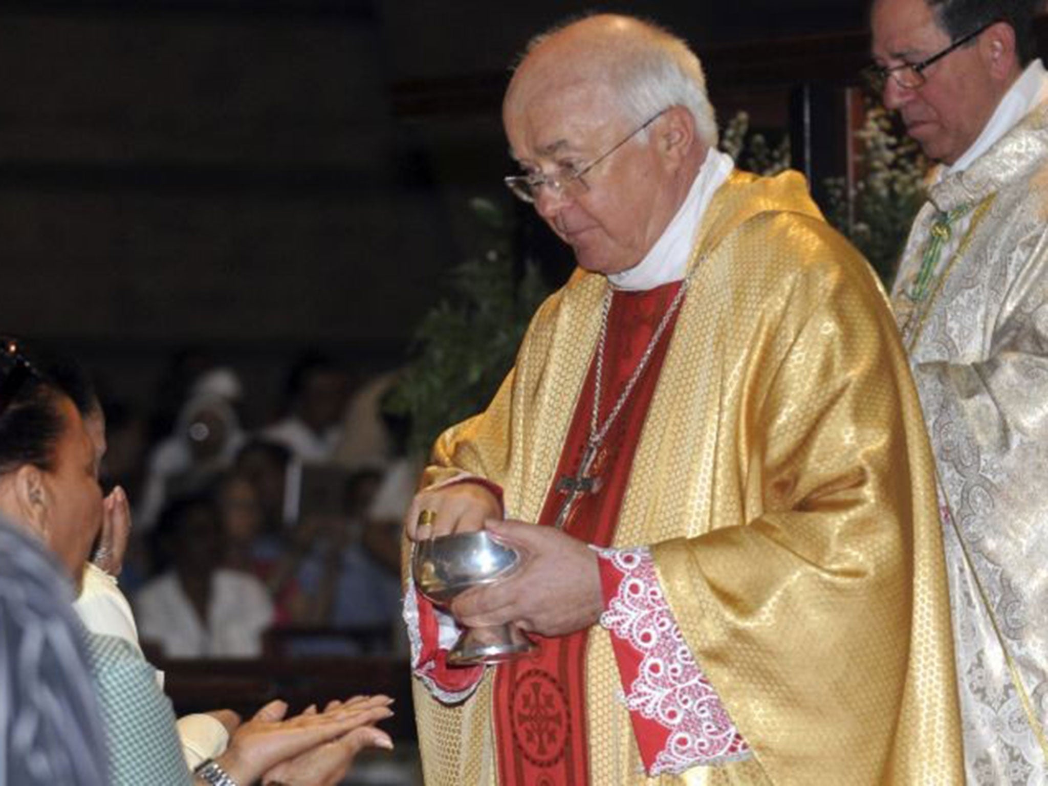 Archbishop Josef Wesolowski, papal nuncio for the Dominican Republic, leads a Mass in Santo Domingo, Dominican Republic. Wesolowski has been convicted by a church tribunal of sex abuse and has been defrocked, the first such sentence handed down against a