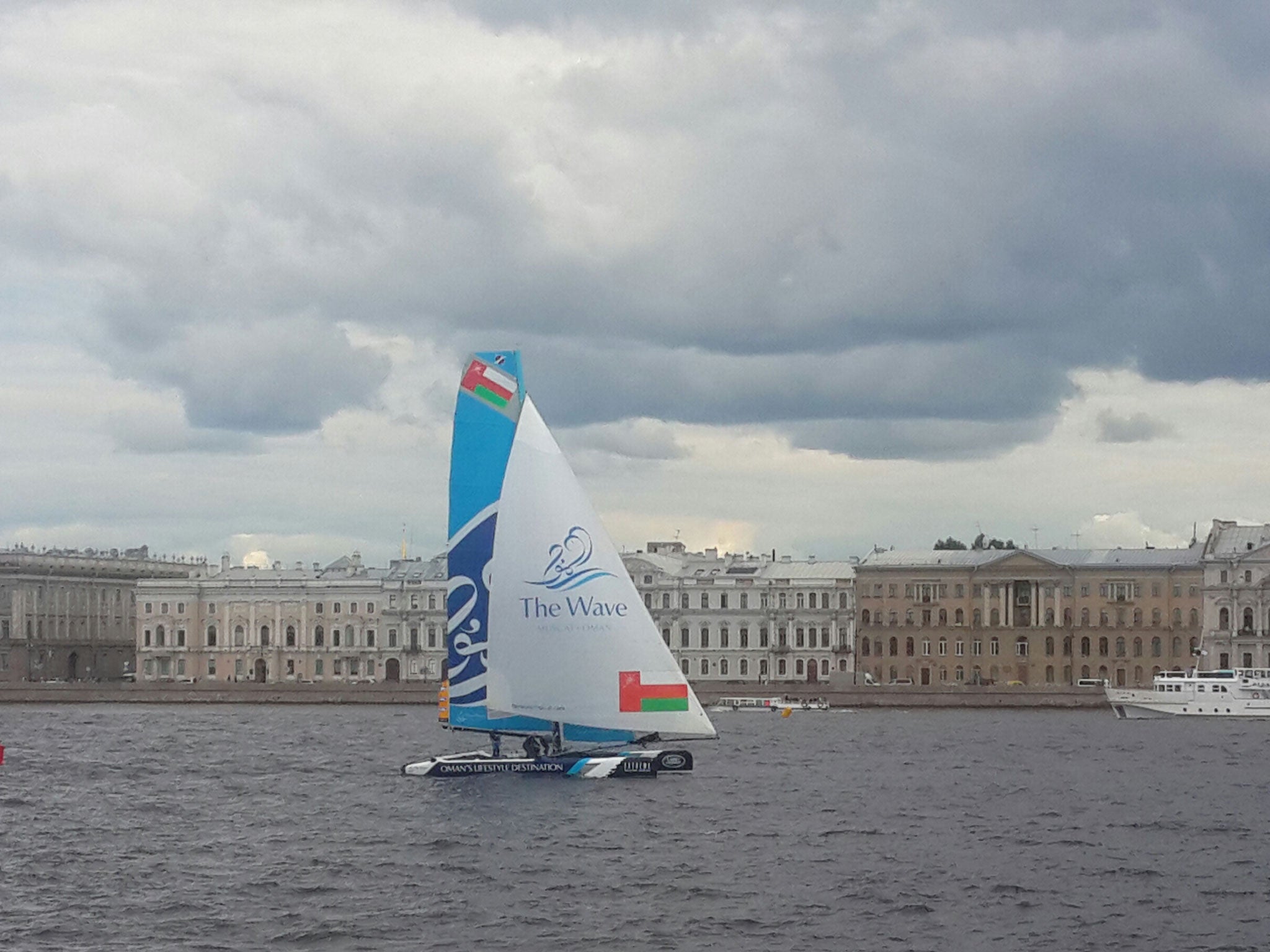 Out on its own, defending champion The Wave, Muscat, skippered by Leigh McMillan and with double gold medallist Sarah Ayton in the crew, trounced the opposition on the first race of the day in the Extreme Sailing Series on the Neva River, St. Petersburg.
