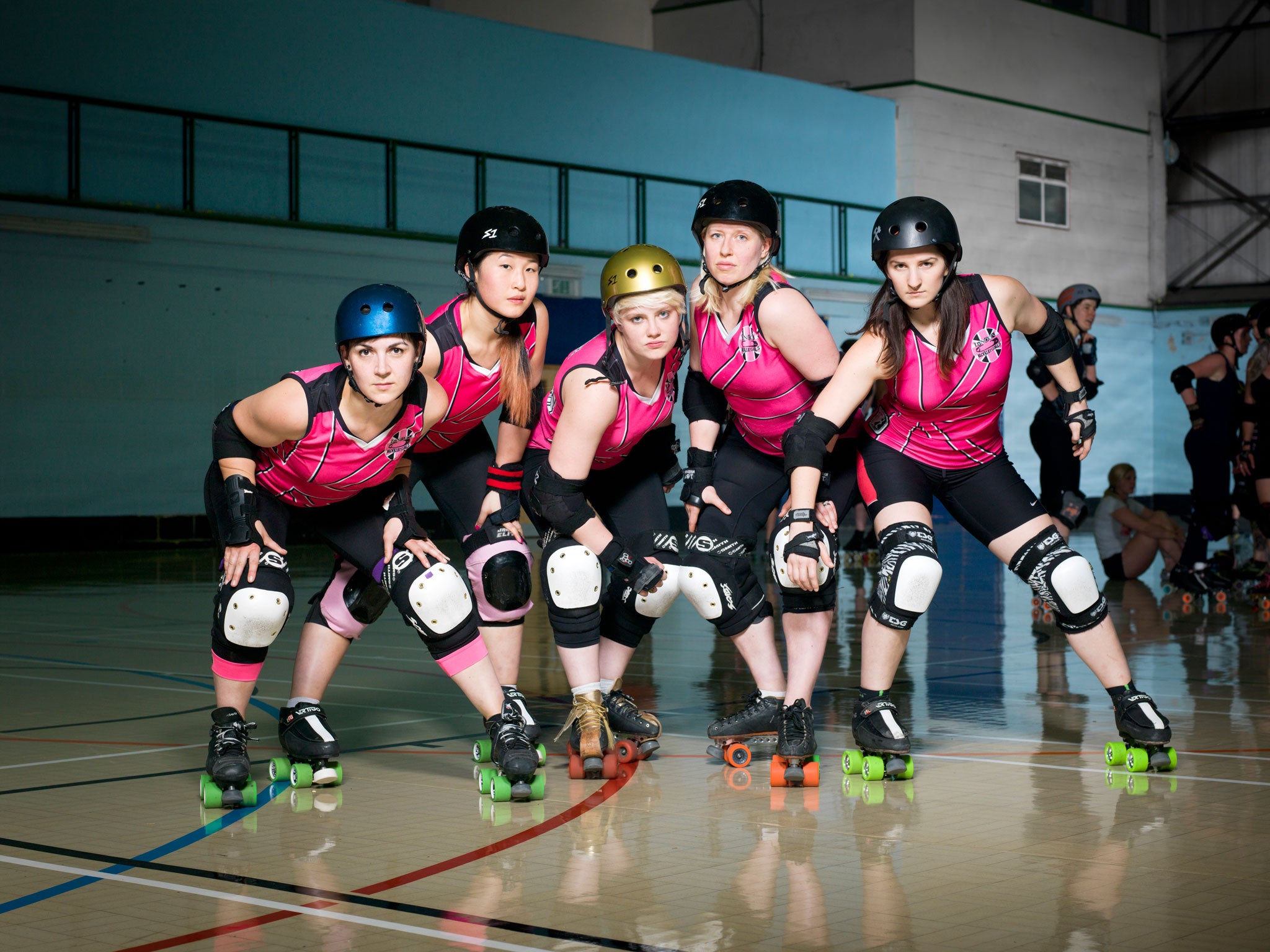 'At the last championship everyone in the roller-derby community went, 'Who the hell are London?' We came in and smashed everybody' says Raw Heidi (centre)
