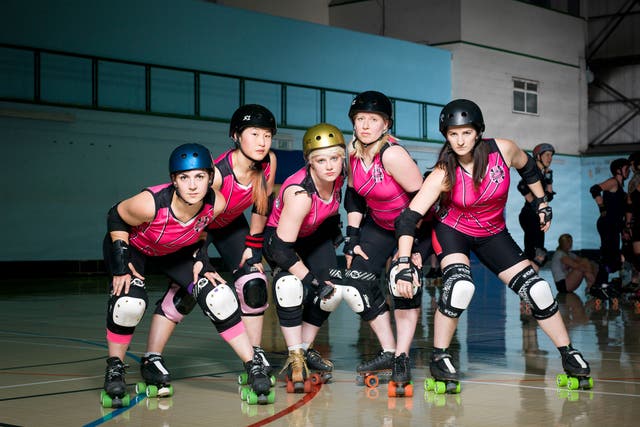 'At the last championship everyone in the roller-derby community went, 'Who the hell are London?' We came in and smashed everybody' says Raw Heidi (centre)