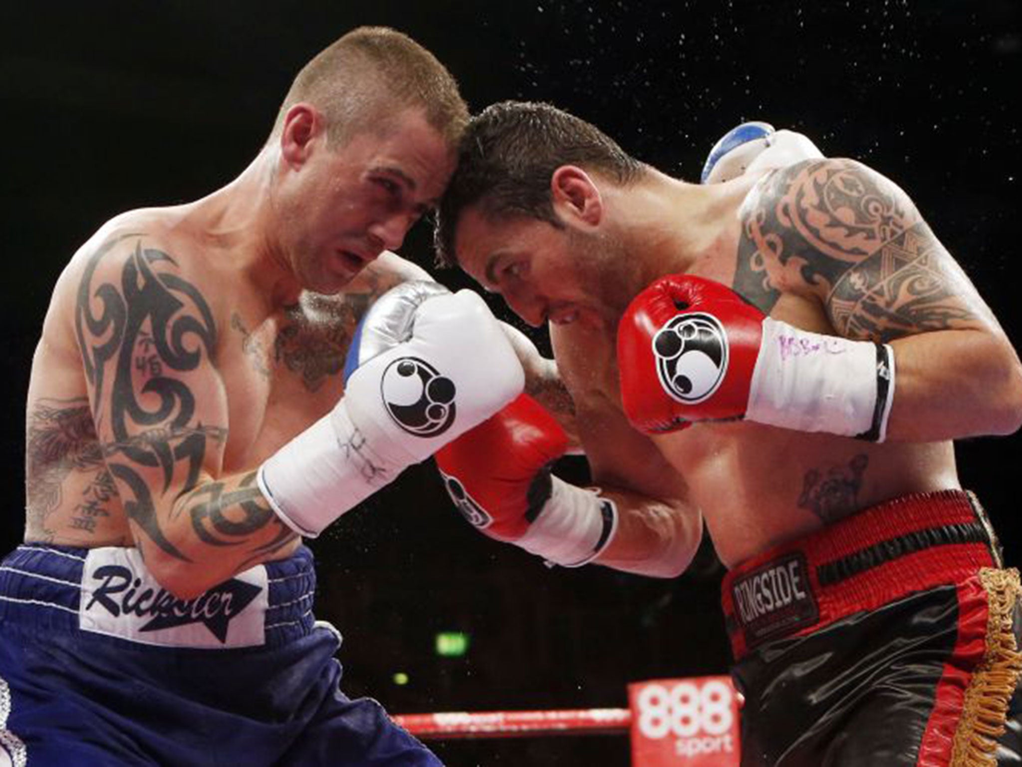 Dejan Zlaticanin (right) and Ricky Burns square off in Glasgow on Friday night