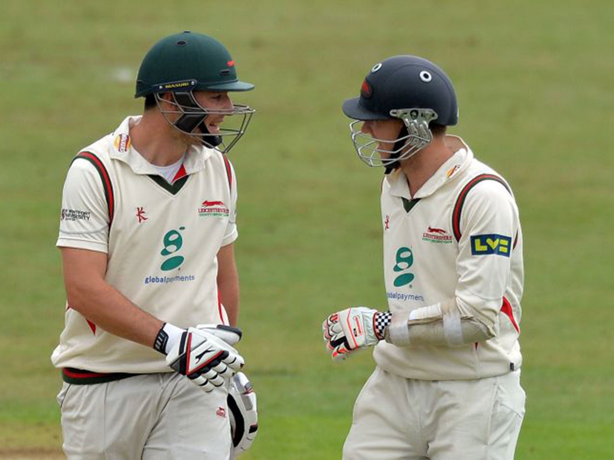Double delight: Leicestershire’s Greg Smith, left, and Angus Robson chat on the way to a century apiece