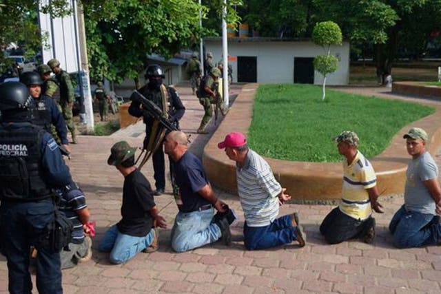 Mexican federal police arrest more than 100 members of self-defence groups in Michoacán state last week
