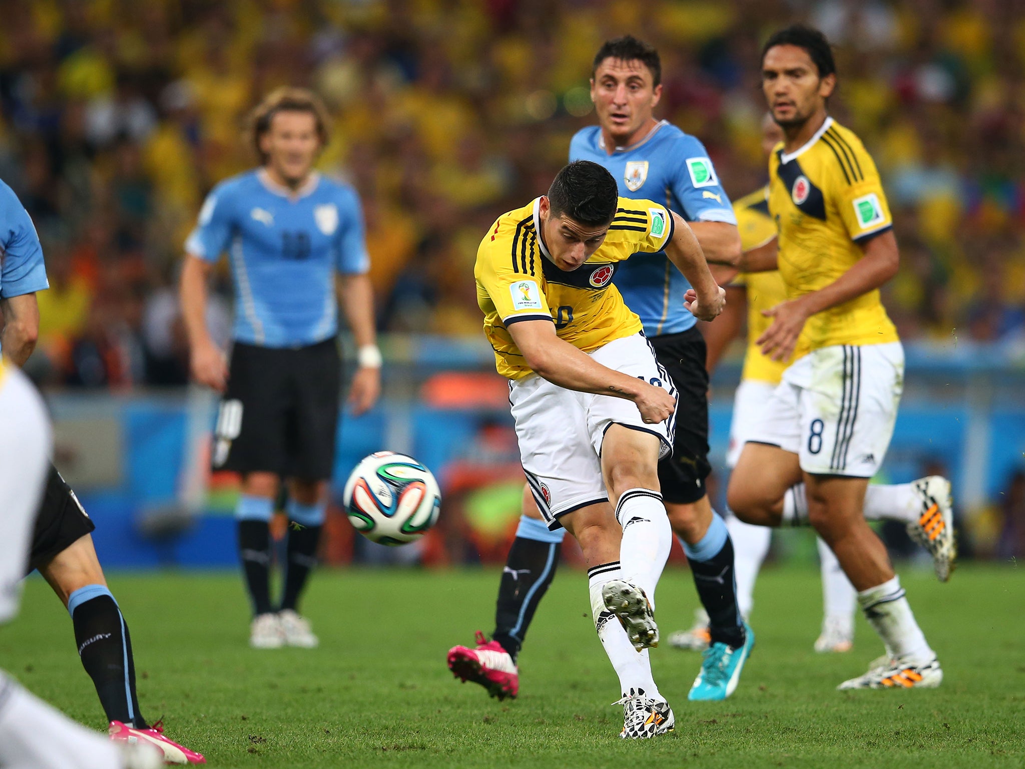 James Rodriguez scores during Colombia's 2-0 win over Uruguay