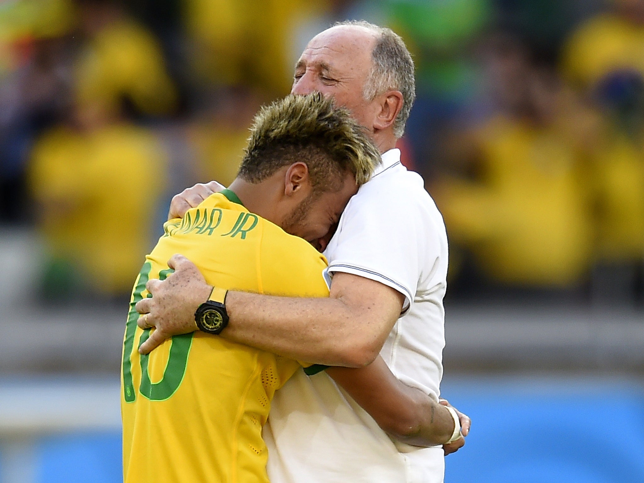 Neymar and Scolari embrace after Brazil went through on penalties against Chile