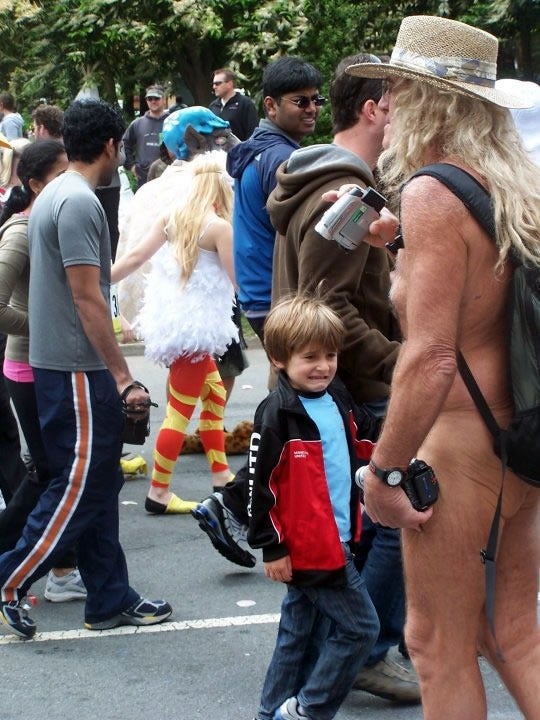 A picture of a naked man horrifying a child has gone viral after it was thought to be from Glastonbury