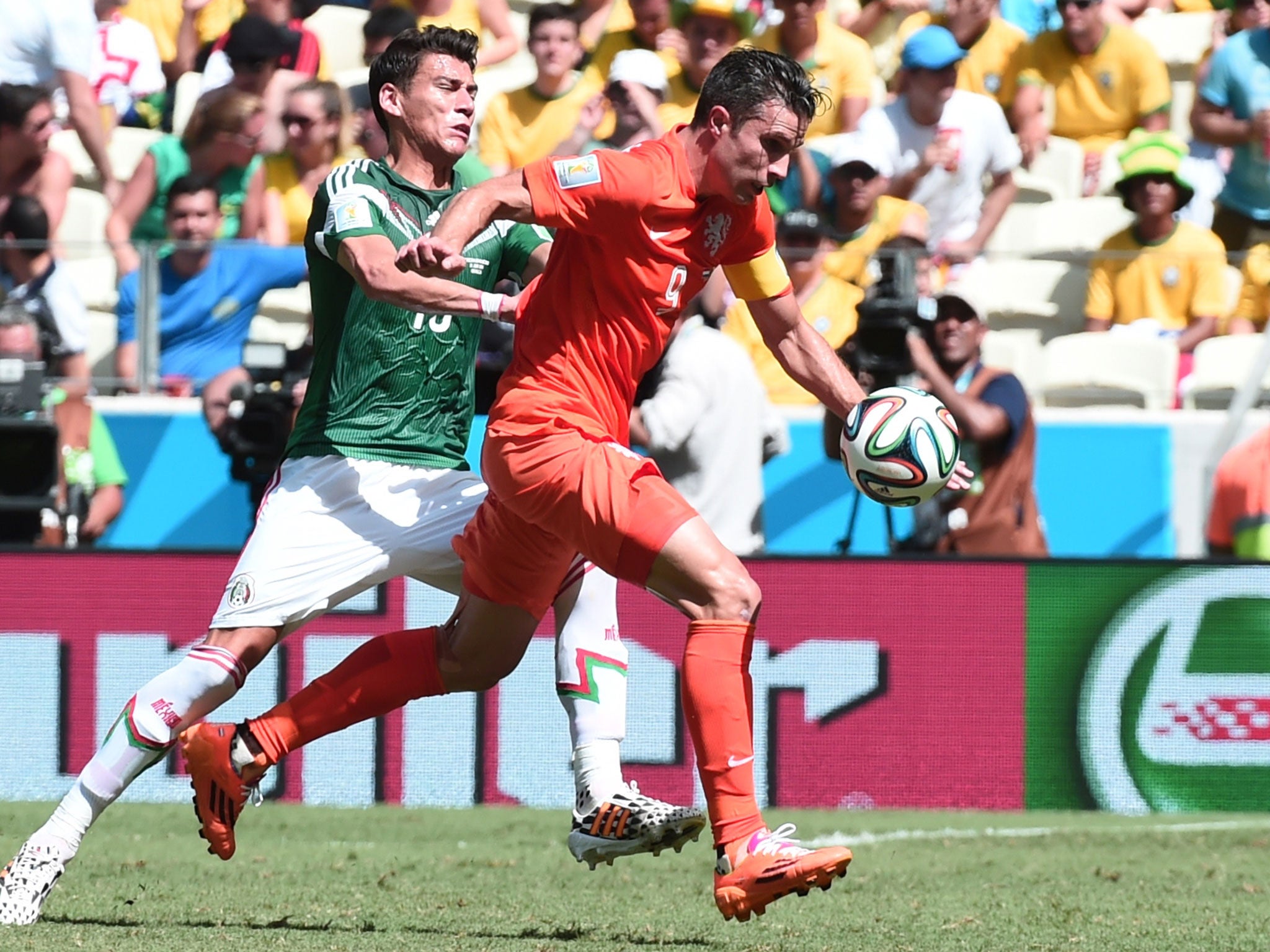 Robin van Persie runs with the ball