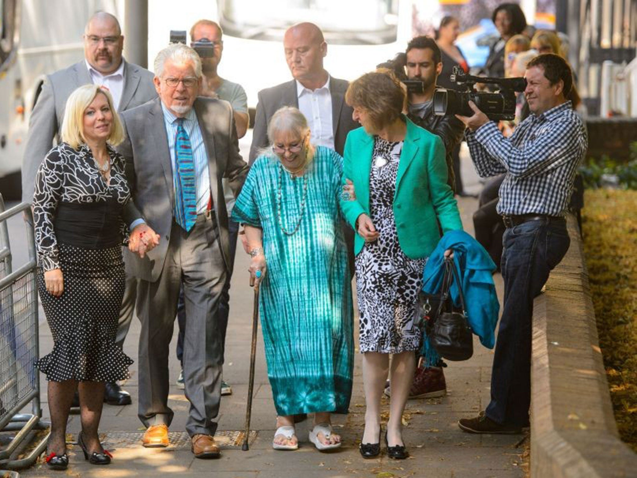 Rolf Harris arriving with daughter Bindi (left), wife Alwen and niece Jenny at Southwark Crown Court on 30 June 2014. He was convicted of 12 counts of indecent assault between 1968 and 1986