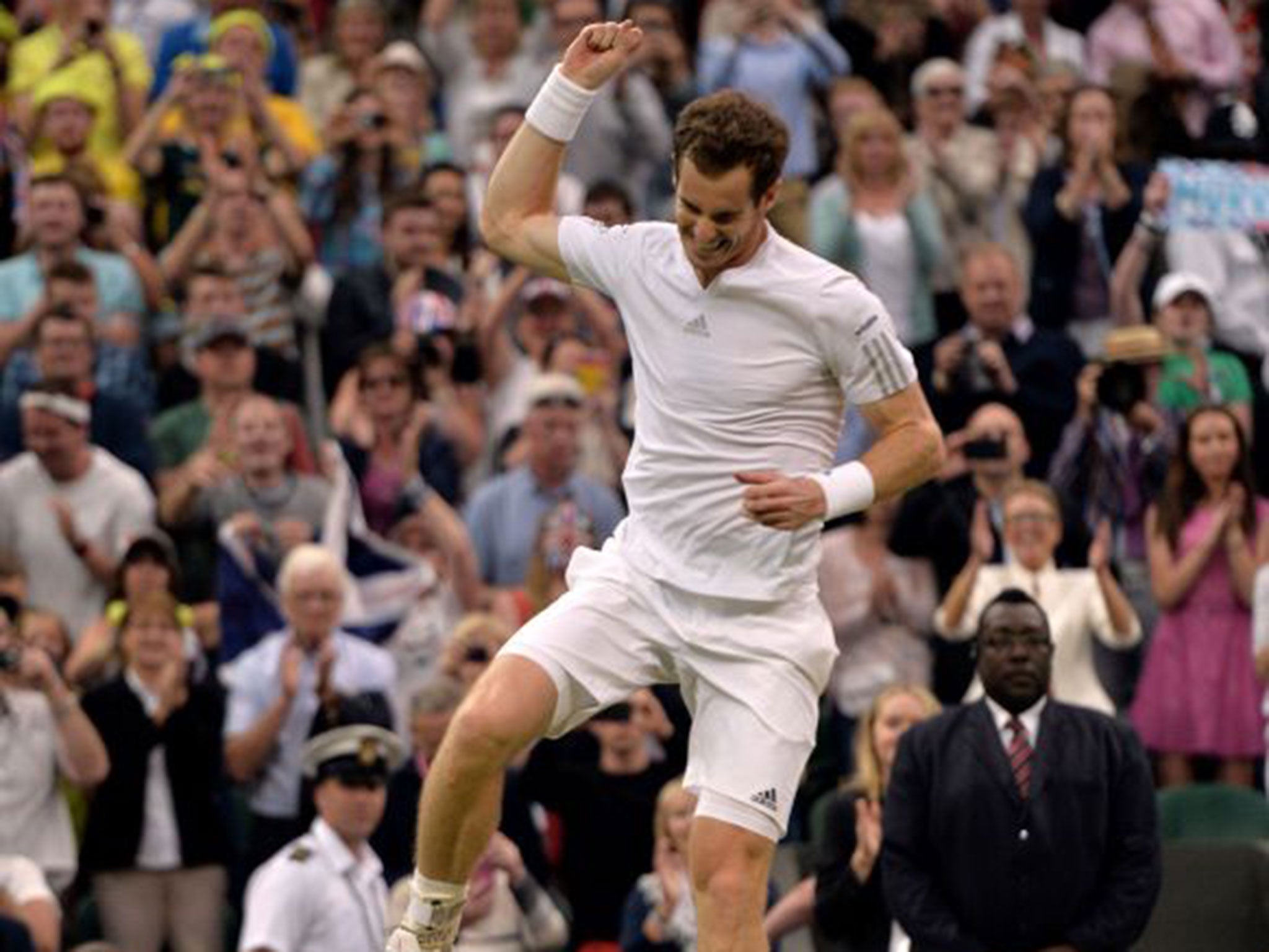 Andy Murray celebrates after beating South African Kevin Anderson in straight sets in their fourth-round match