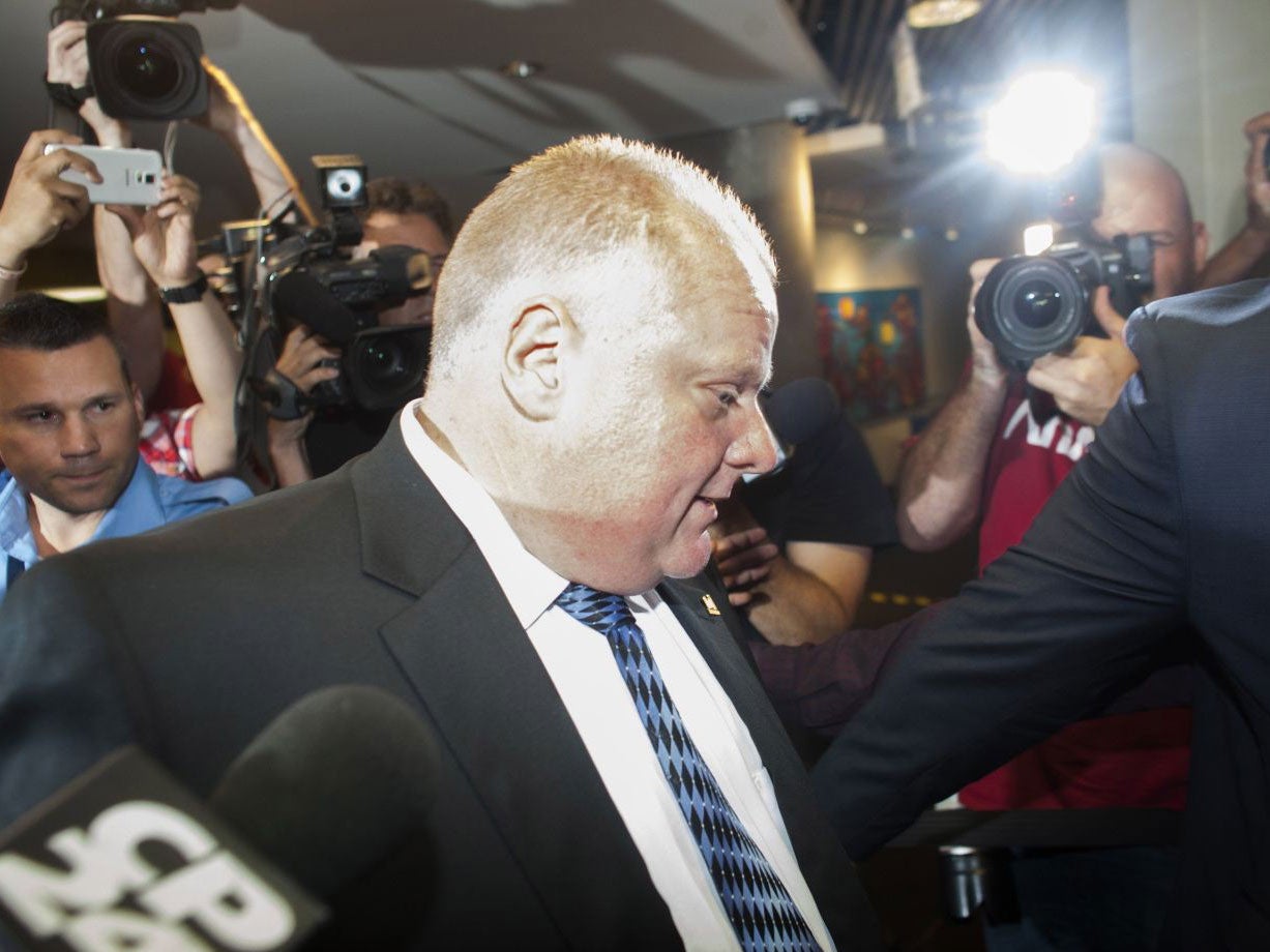 Rob Ford leaving his office on his first day back from rehab