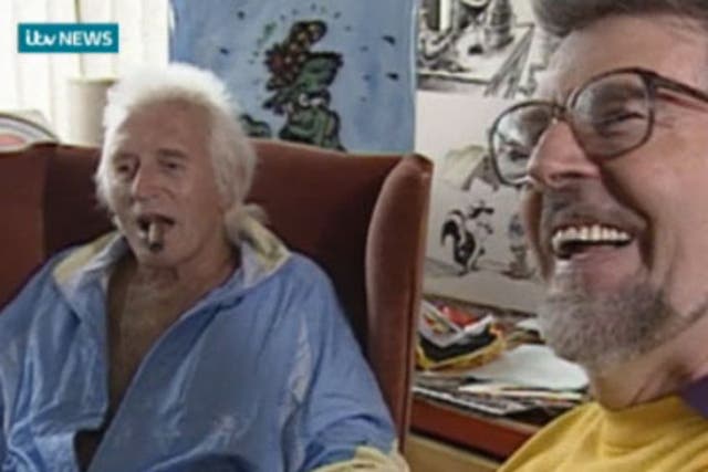 <p>Footage from 1992 shows Rolf Harris drawing a portrait of Jimmy Savile as the pair joke together at ITV West studios in Bristol</p>