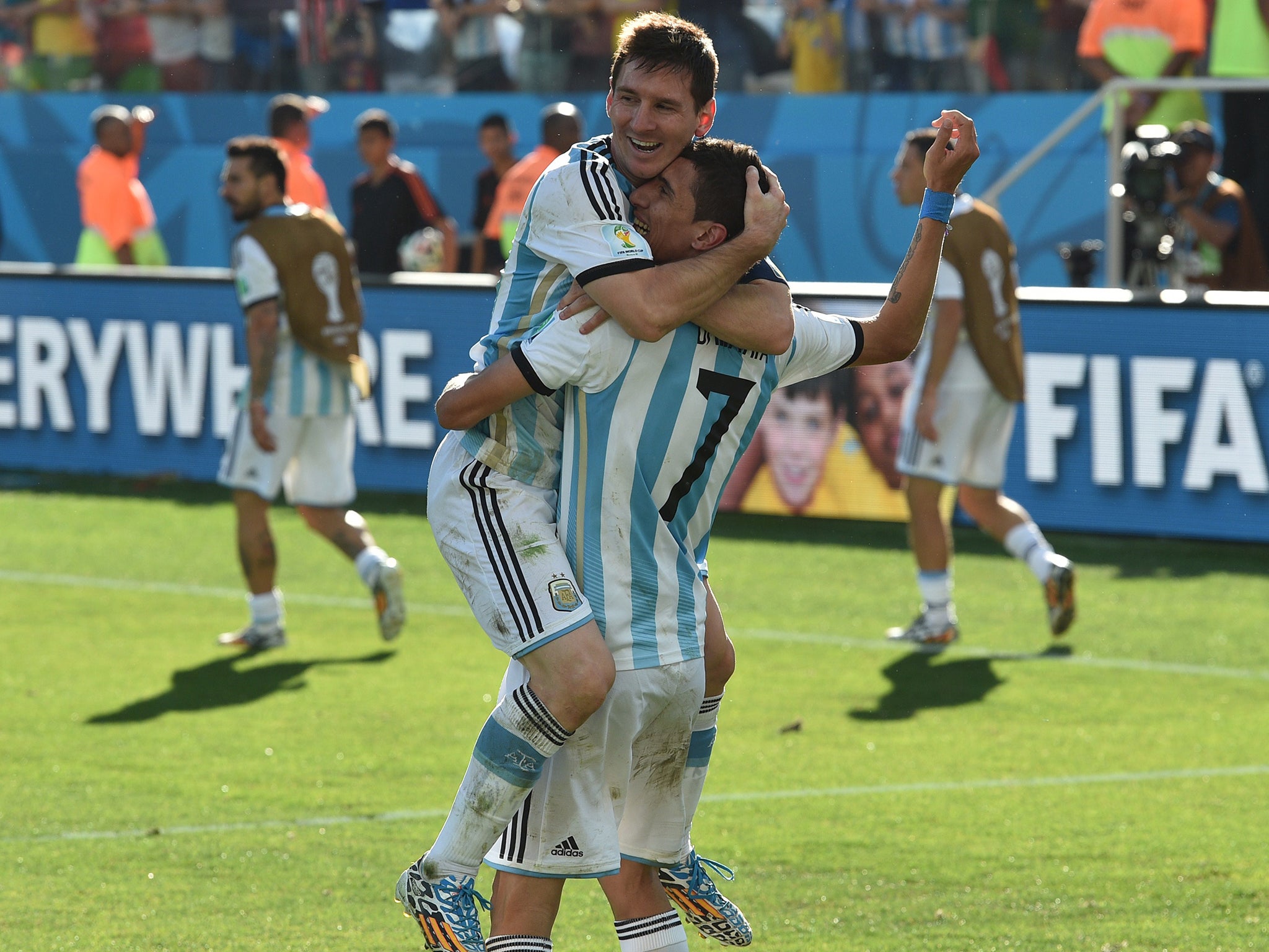Angel di Maria celebrates his goal with Lionel Messi