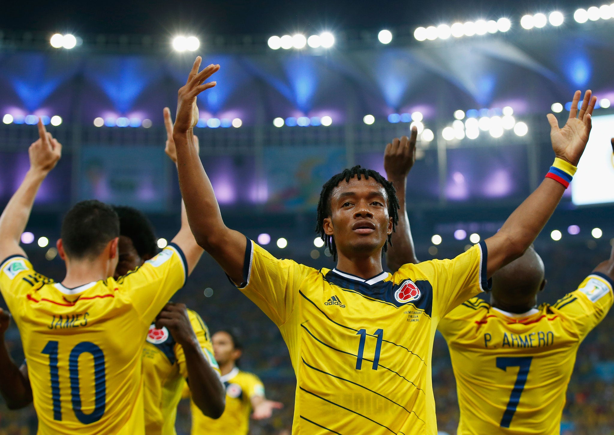 Colombia's Juan Guillermo Cuadrado celebrates his team's second goal against Uruguay