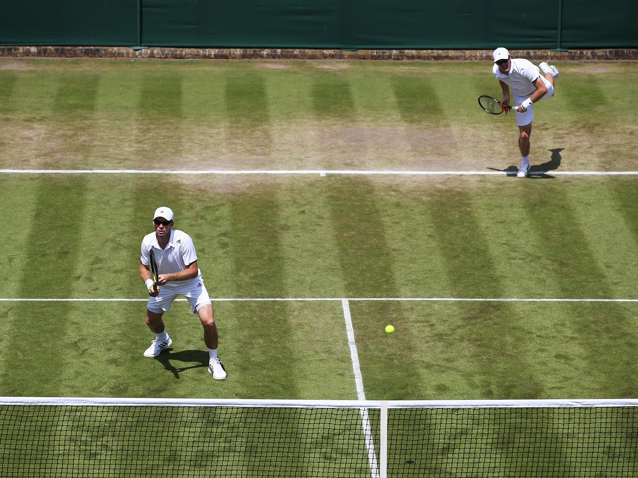 John Peers of Australia (l) and Jamie Murray of Great Britain (r) during their Gentlemen's Doubles third round defeat