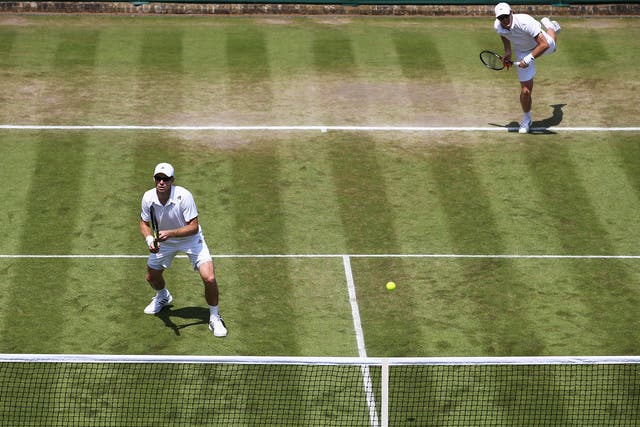 John Peers of Australia (l) and Jamie Murray of Great Britain (r) during their Gentlemen's Doubles third round defeat