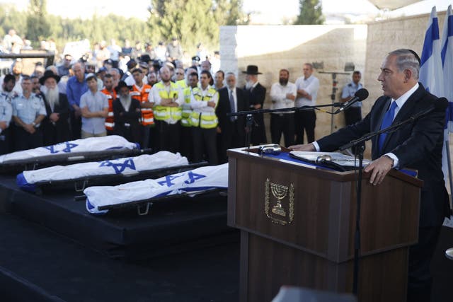 sraeli Prime Minister Benjamin Netanyahu (R) eulogizes three Israeli teens who were abducted and killed in the occupied West Bank, Gil-Ad Shaer, US-Israeli national Naftali Fraenkel, both 16, and Eyal Yifrah, 19, during their joint funeral in the Israeli 