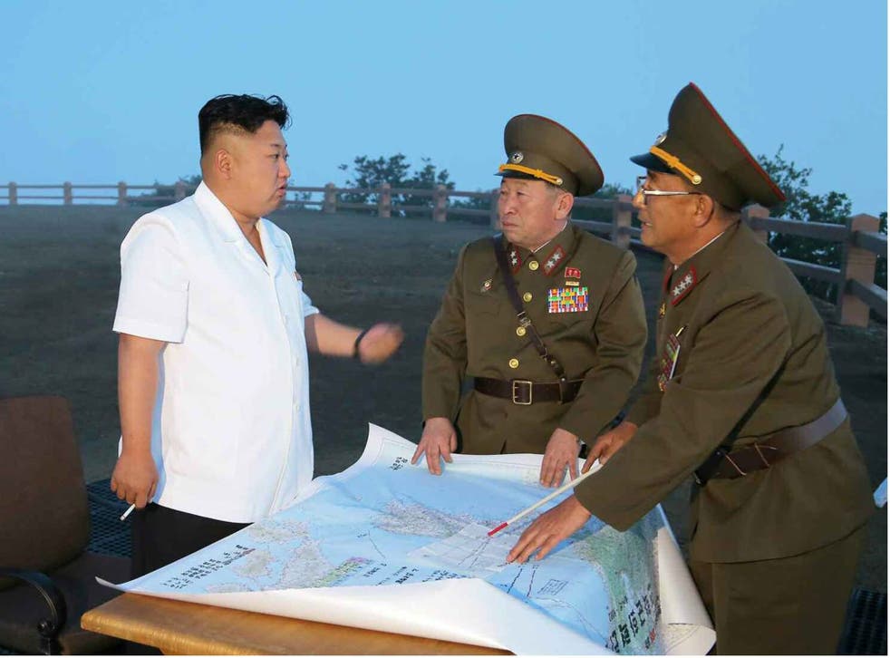 Kim Jong-un, possibly discussing formations for Saturday's clash with Burnley